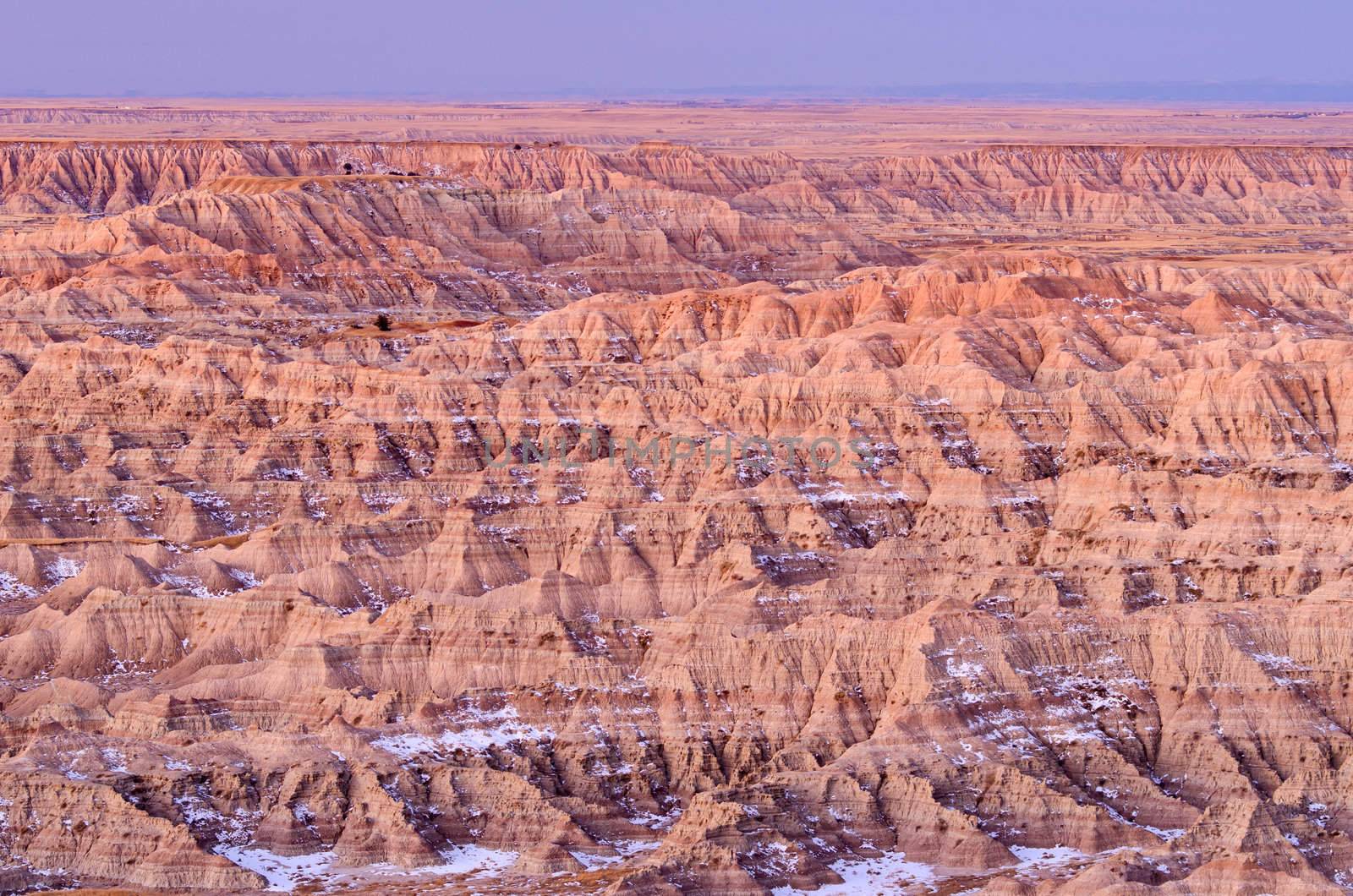 A labyrinth of ravines and ridges at sunrise, Badlands National Park, South Dakota, USA by CharlesBolin