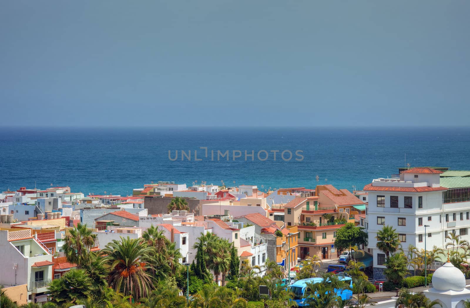 Shoreline of Atlantic ocean, cityscape view of Tenerife island. by borodaev