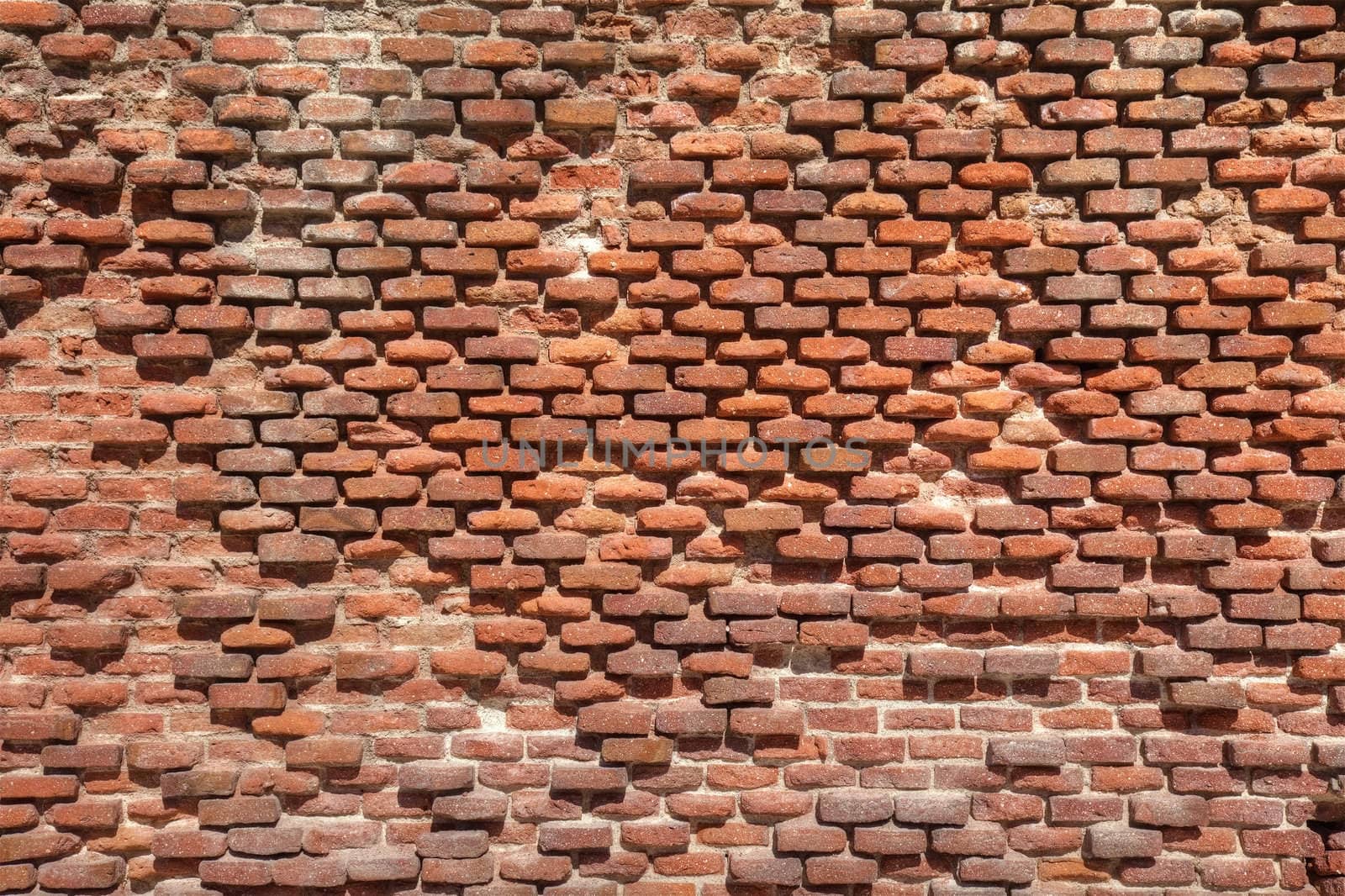 Old weathered brick wall as texture. by borodaev