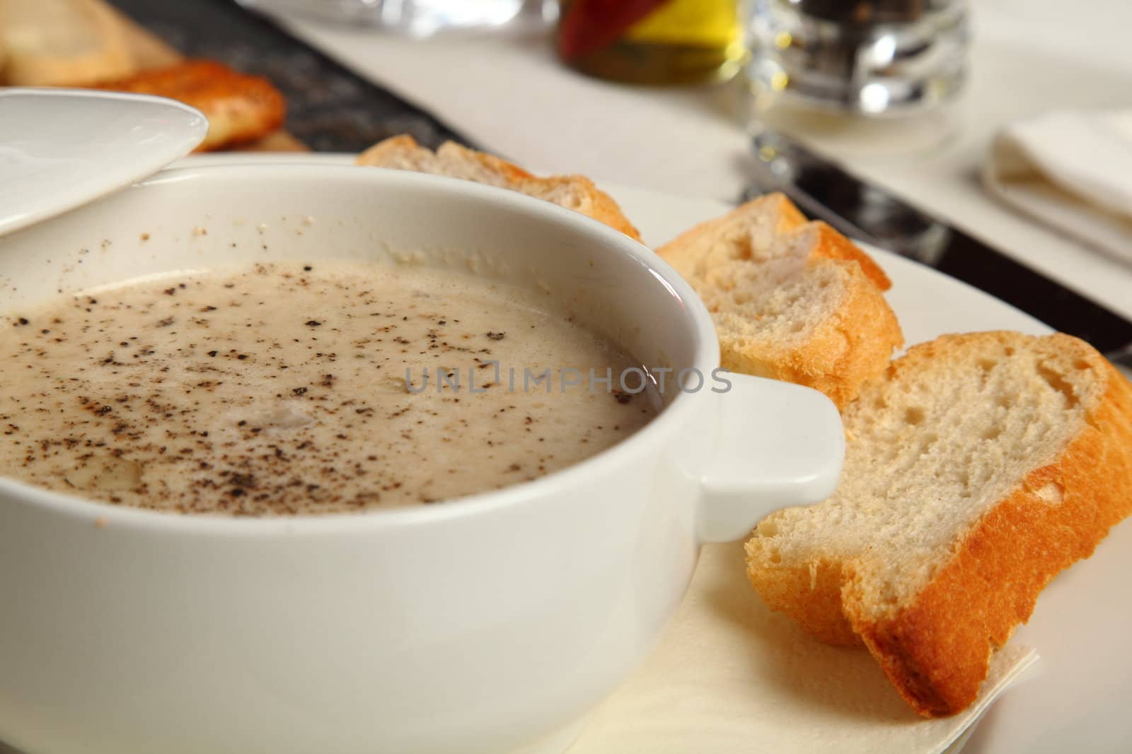 Mushroom porcini soup served with bread