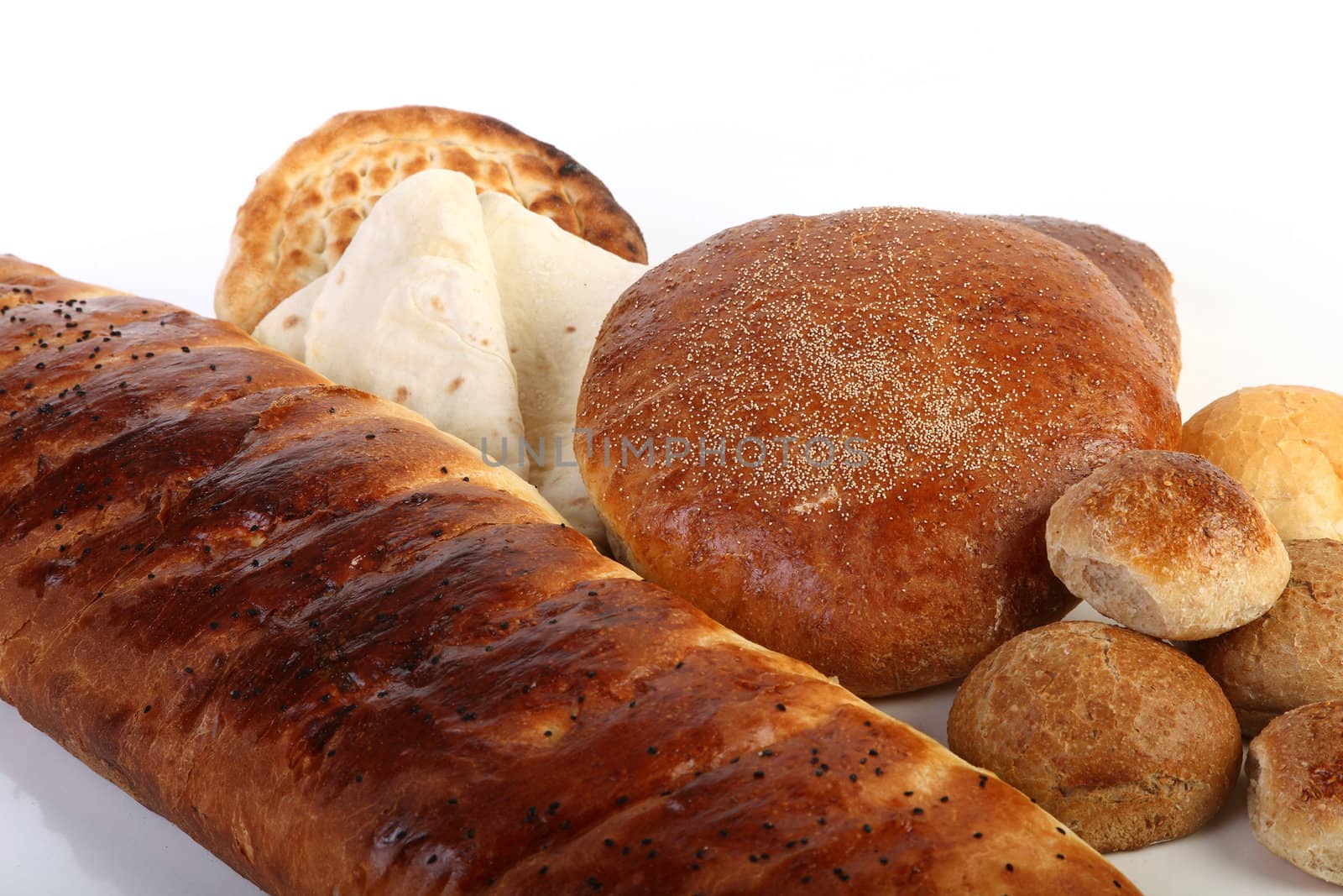 Fresh different type of bread on white background