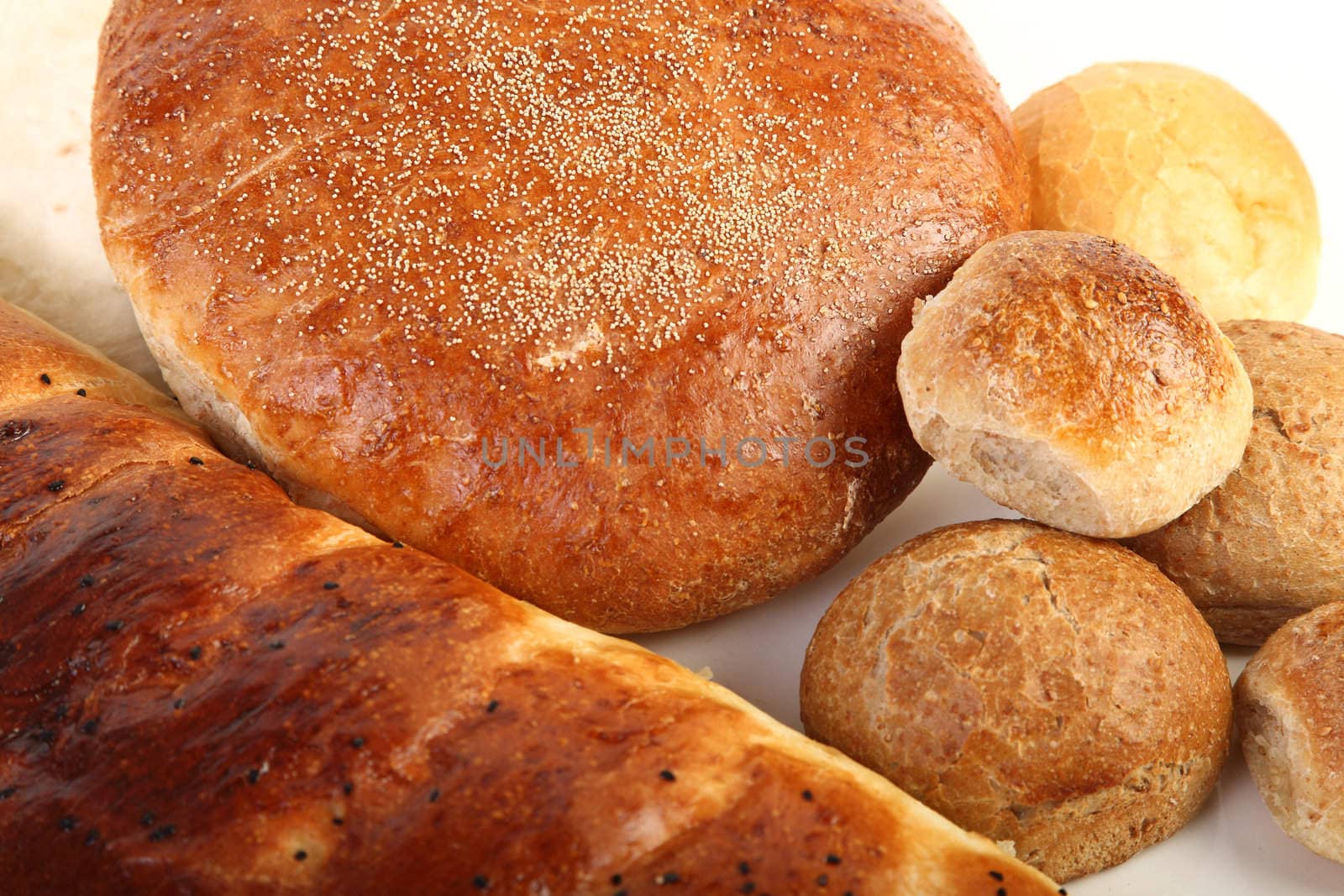 Fresh different type of bread on white background