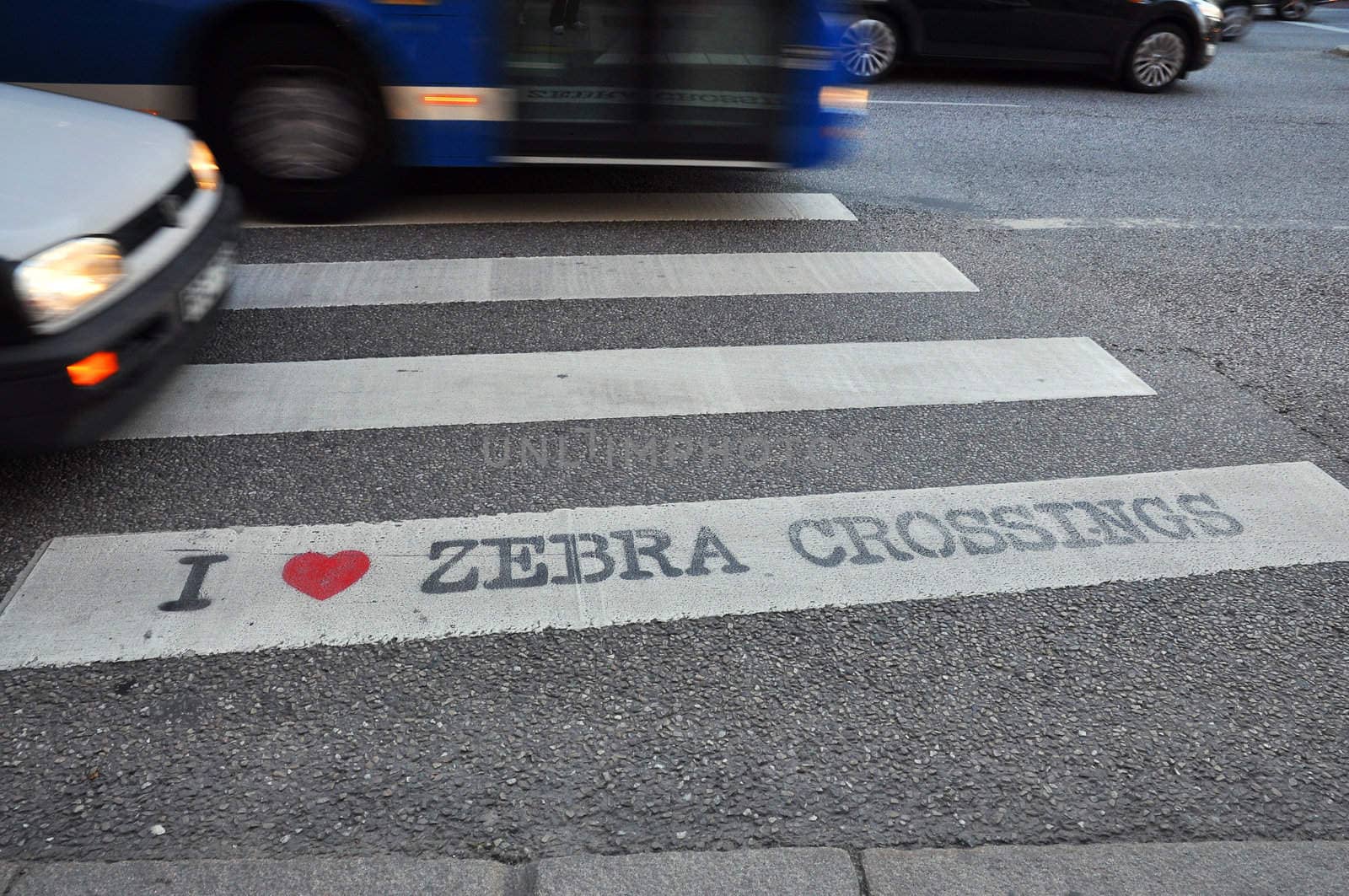 I love zebra crossings written on a zebra crossing.
