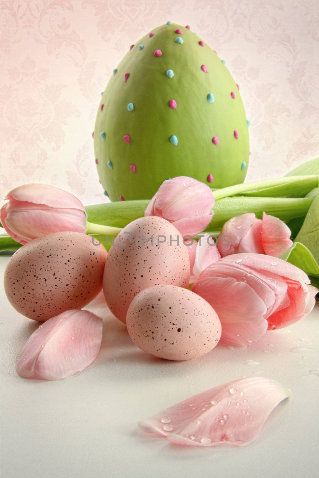 Large easter egg and pink tulips with vintage feeling