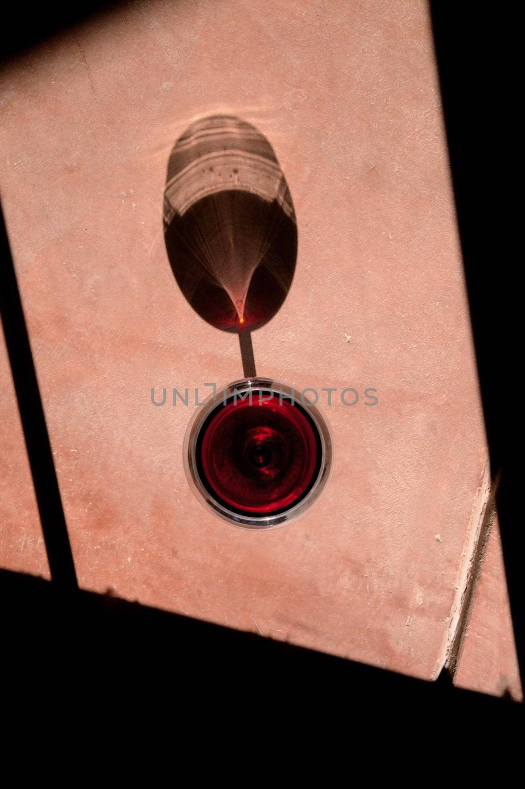 Wine Glass with Dramatic Shadow by Creatista