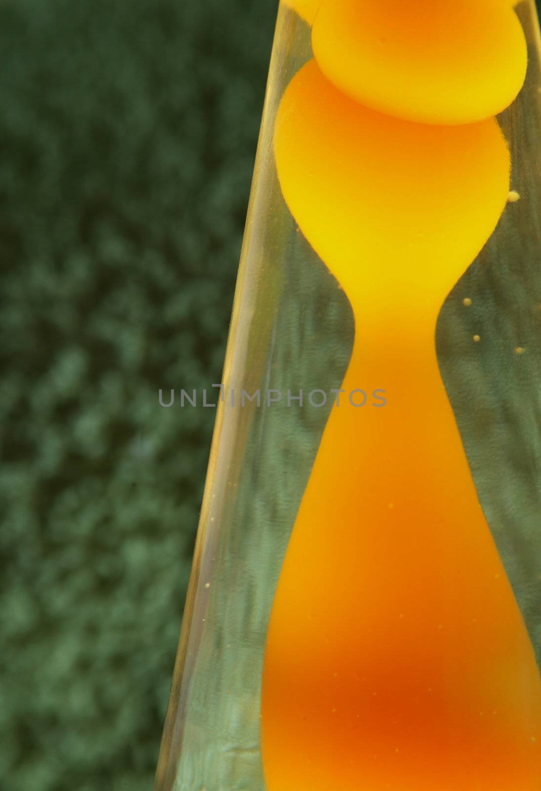 Lava lamp with yellow contents.