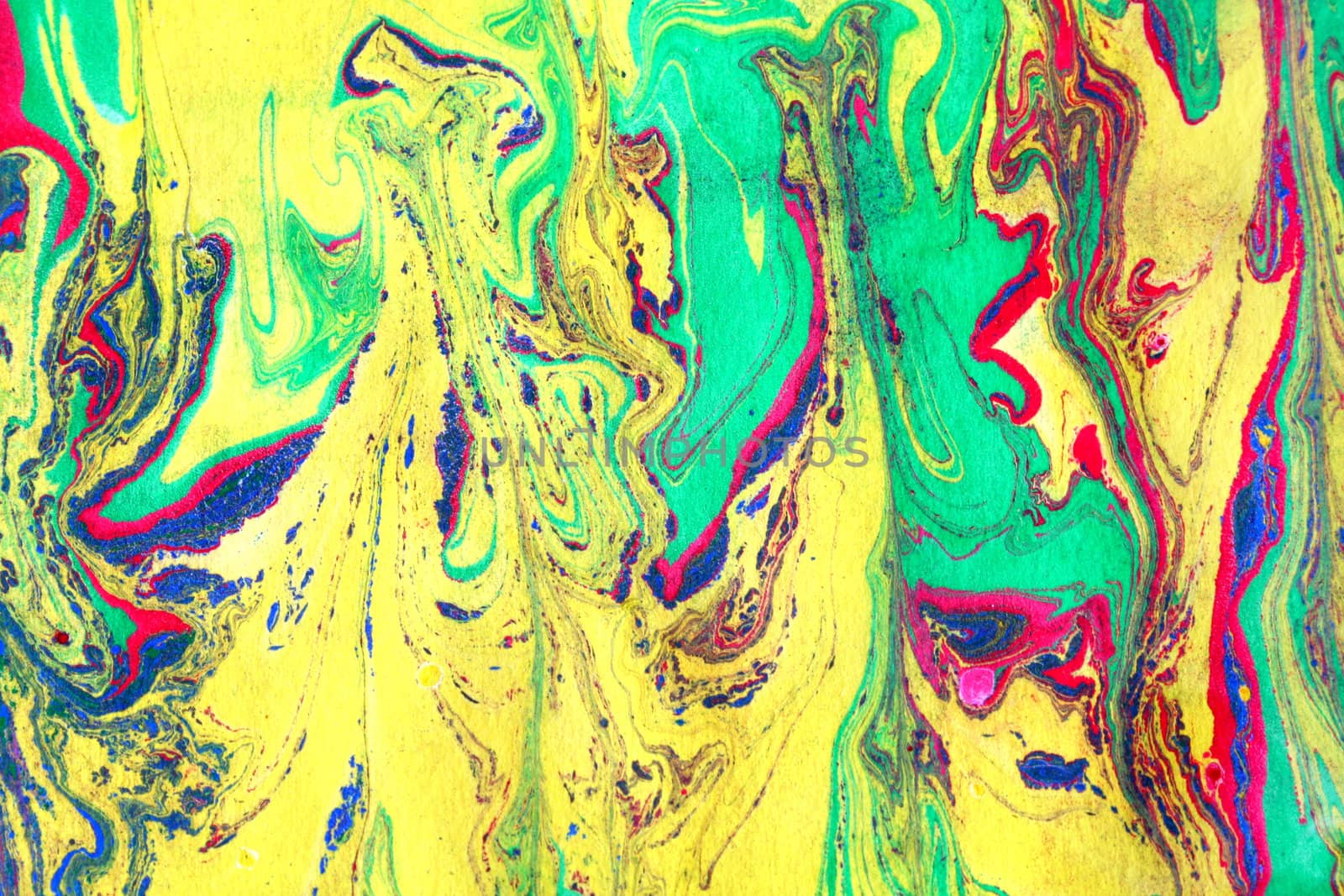 Blown ink art that makes for a color abstract background.