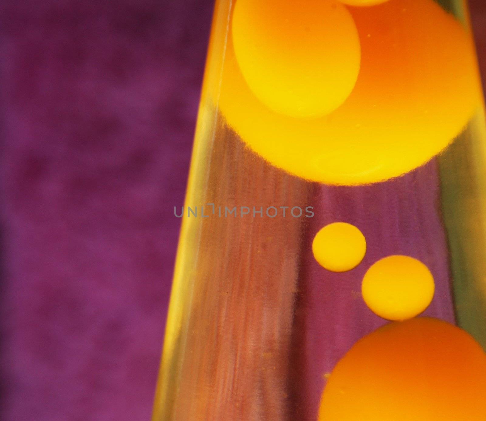 Lava lamp with yellow contents.