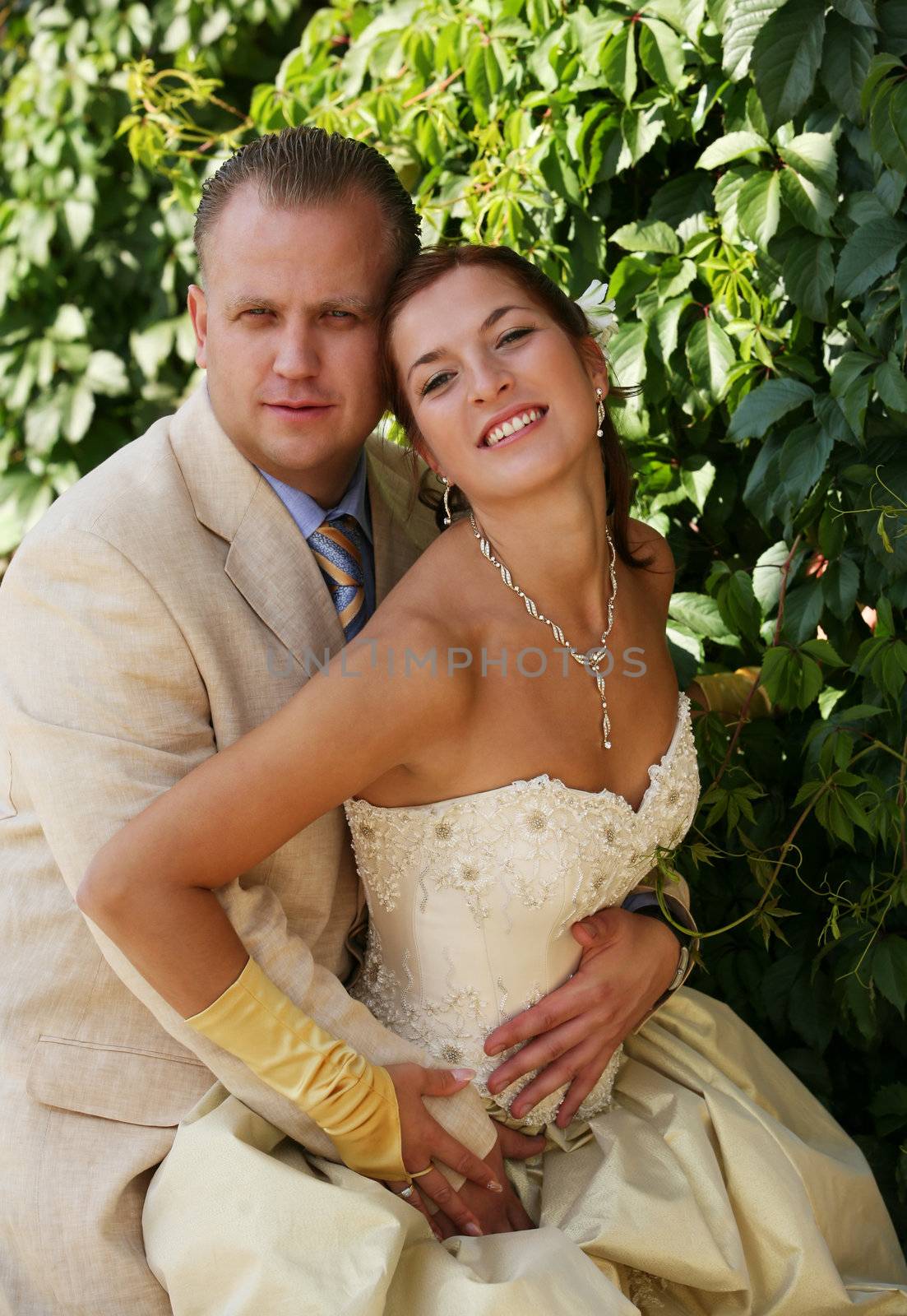 Beautiful newly married pair in park