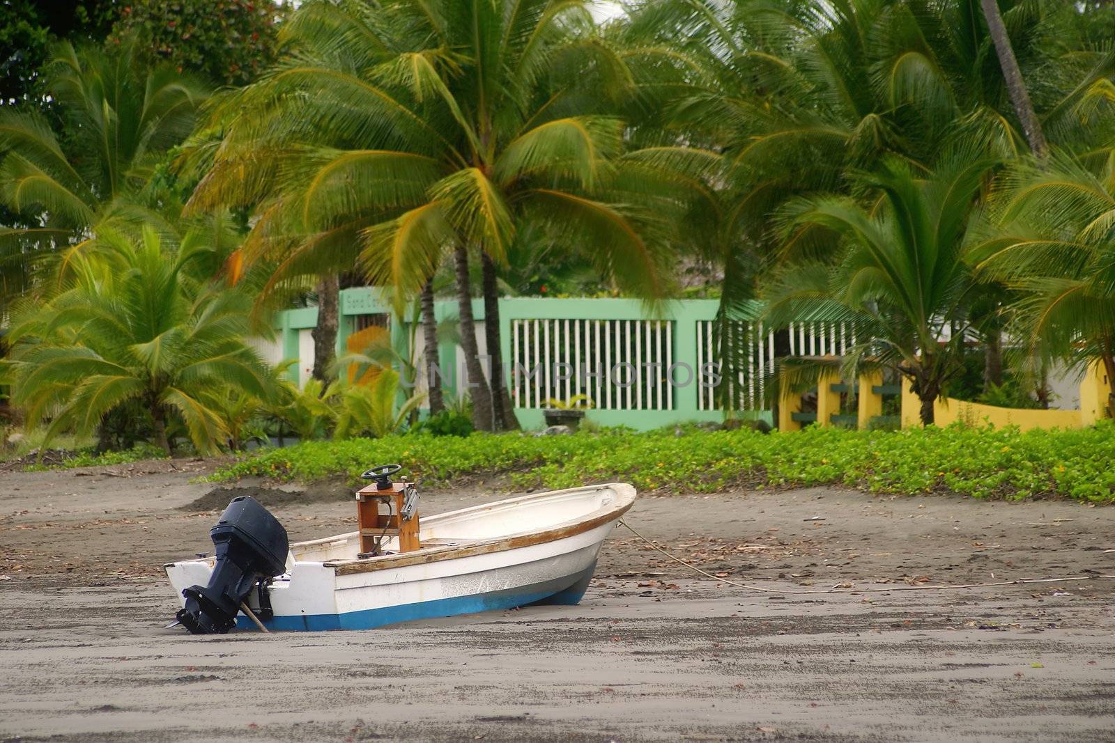 A fishing boat grounded by the low tide.