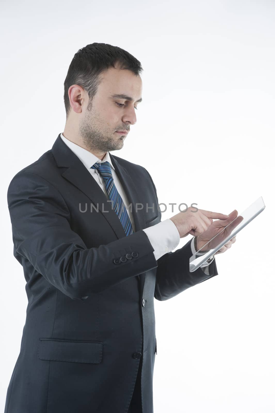 Businessman works with tablet