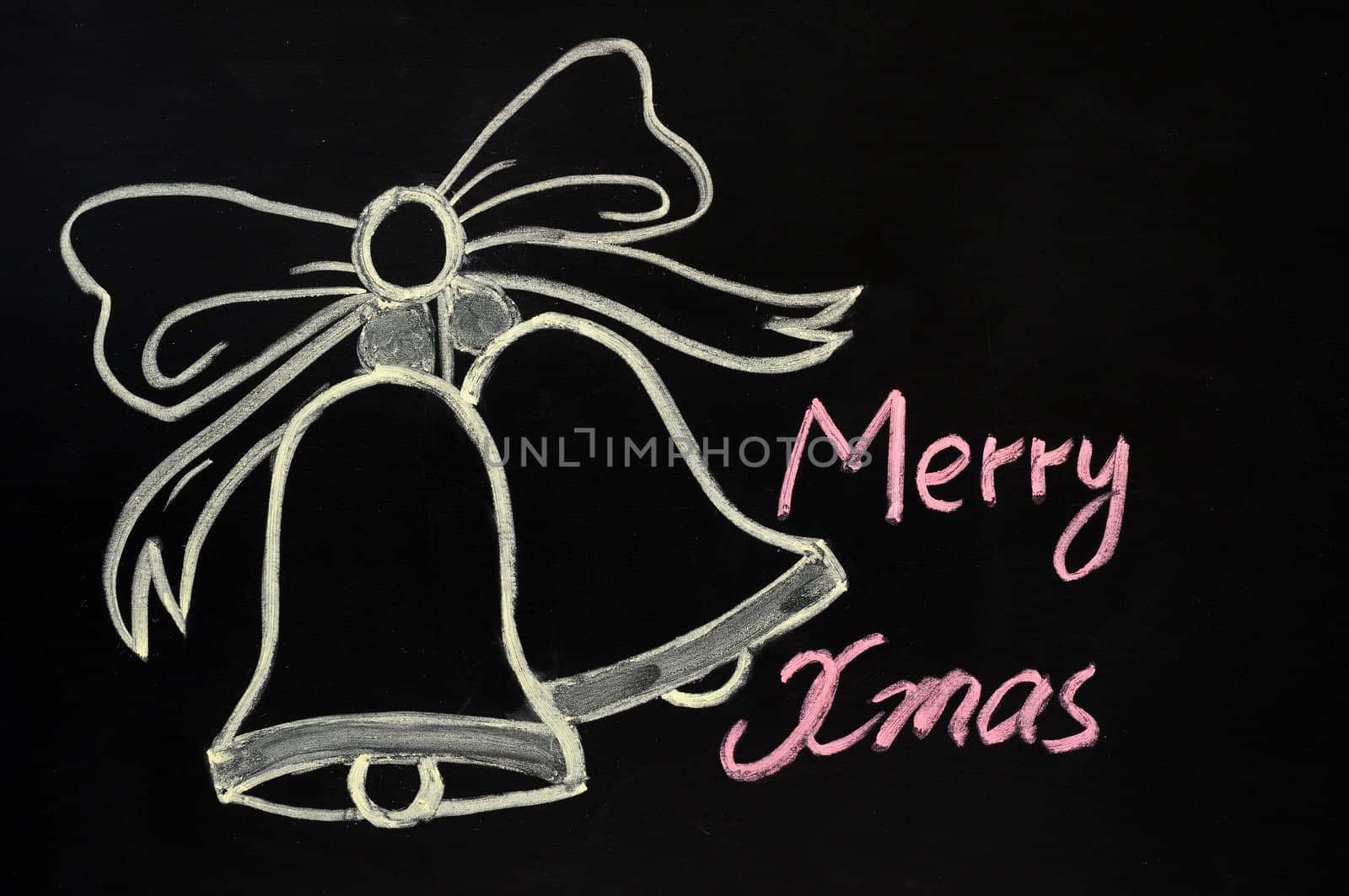 Jingle bells drawn with chalk on a blackboard