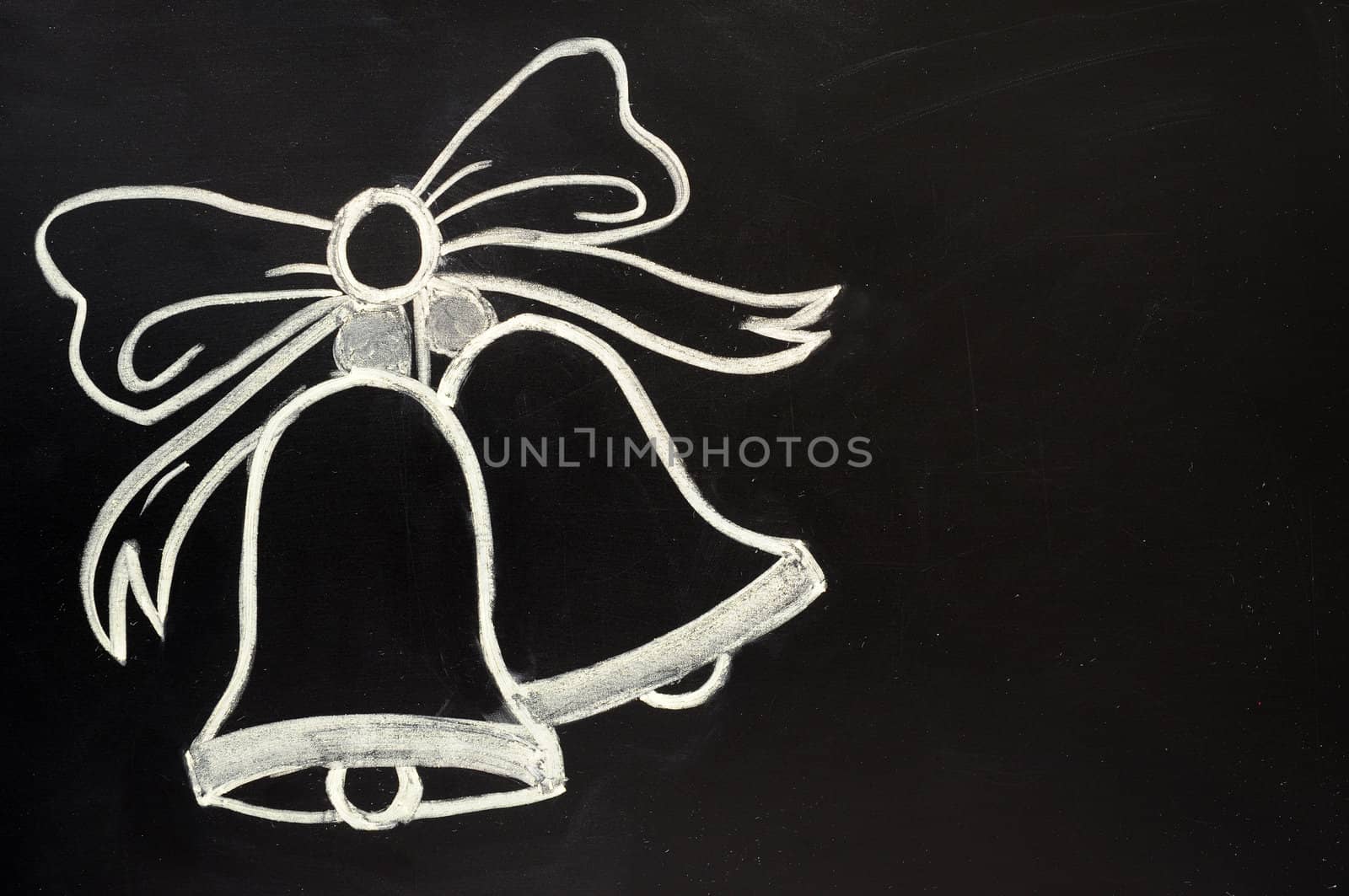 Jingle bells drawn with chalk on a blackboard