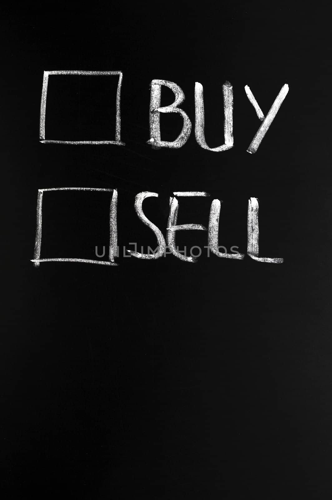 Buy and sell check boxes on a blackboard