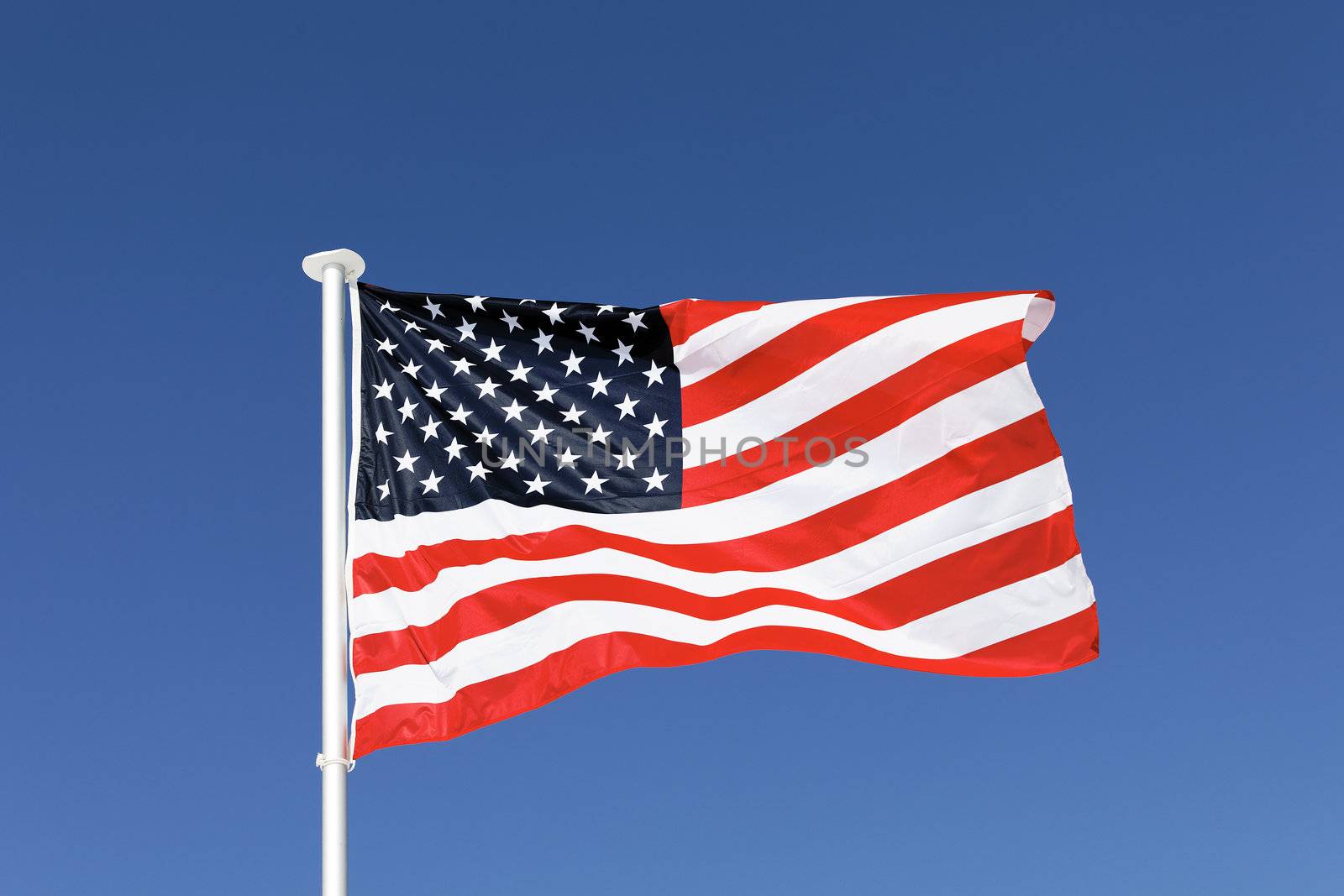 the USA banner in blue sky in summer
