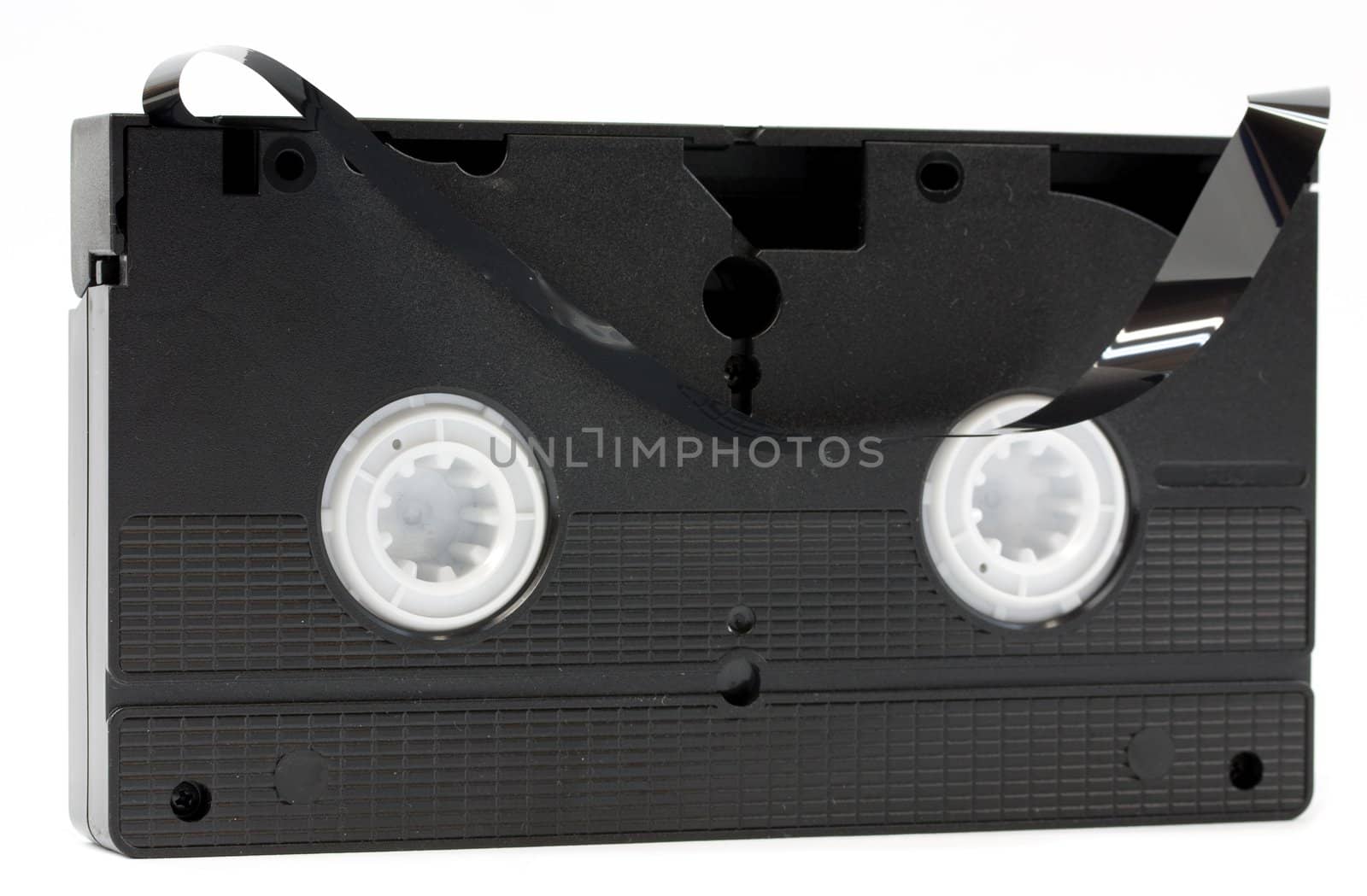Broken video cassette isolated on white background