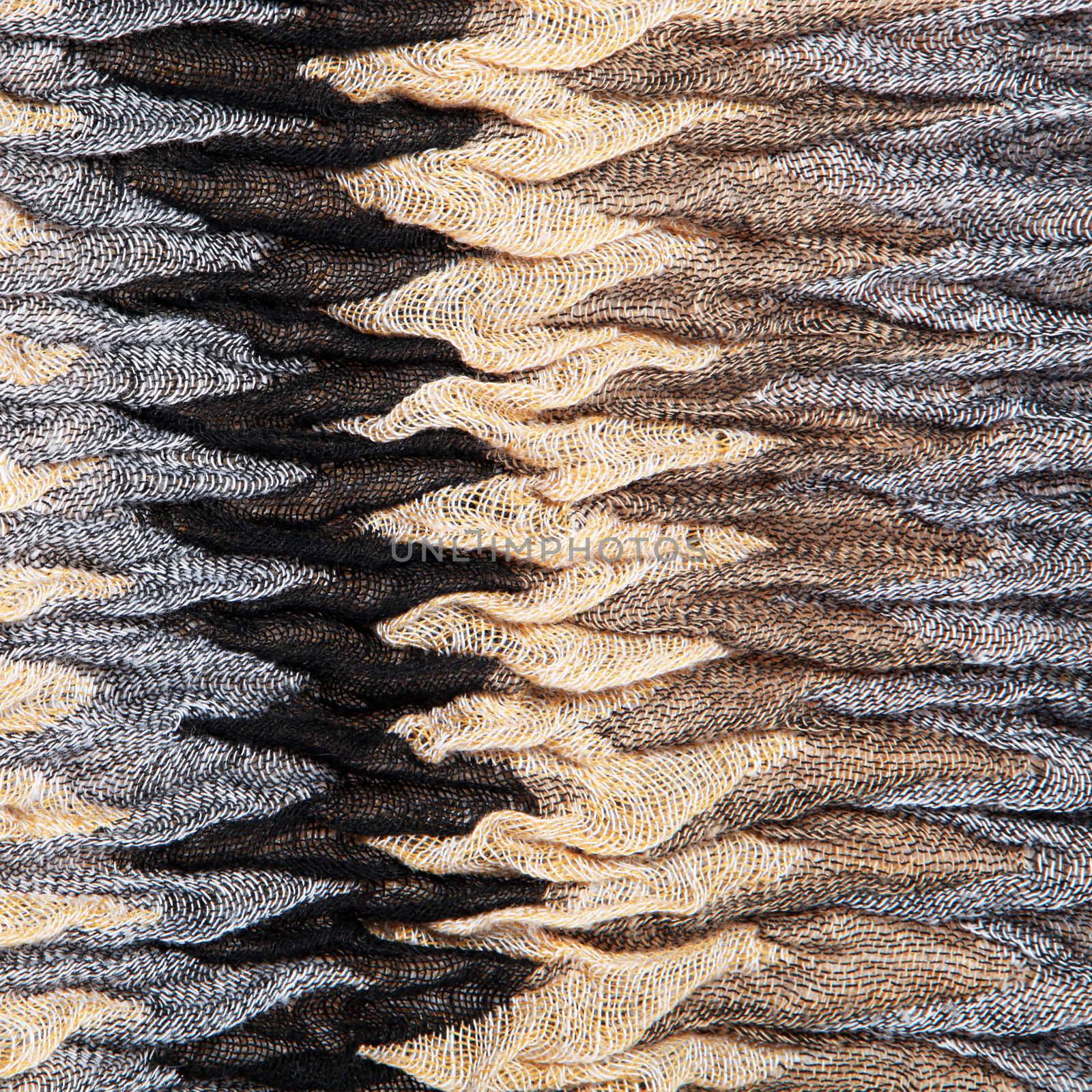 Luxurious knit textured ruched fabric with a distinctive zig-zag striped pattern in shades of brown and grey