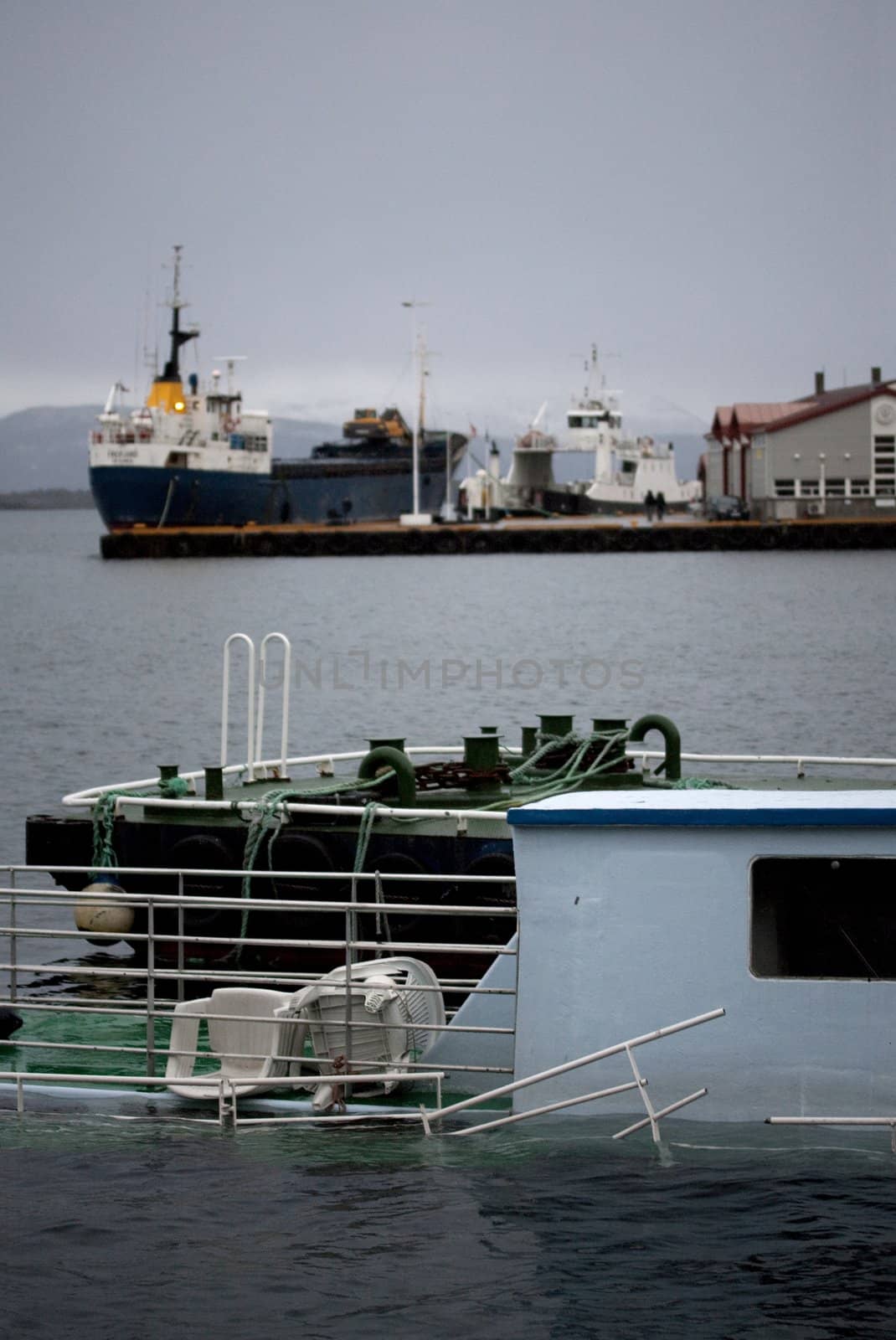 Boats at harbour for repair after hurricane Dagmar