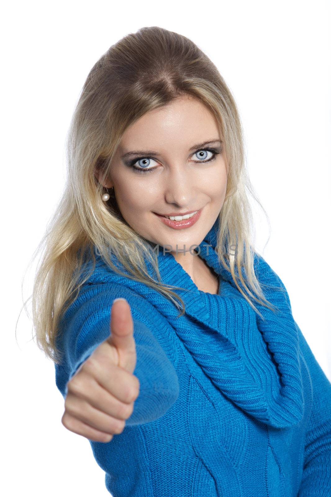Beautiful young woman in thumbs up gesture