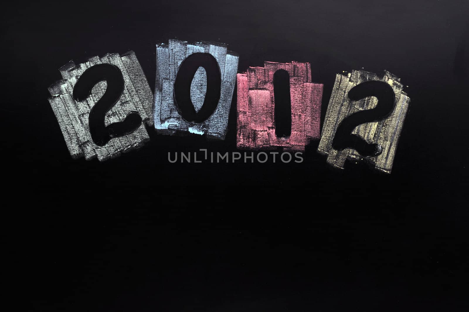 Year 2012 written with chalk on blackboard