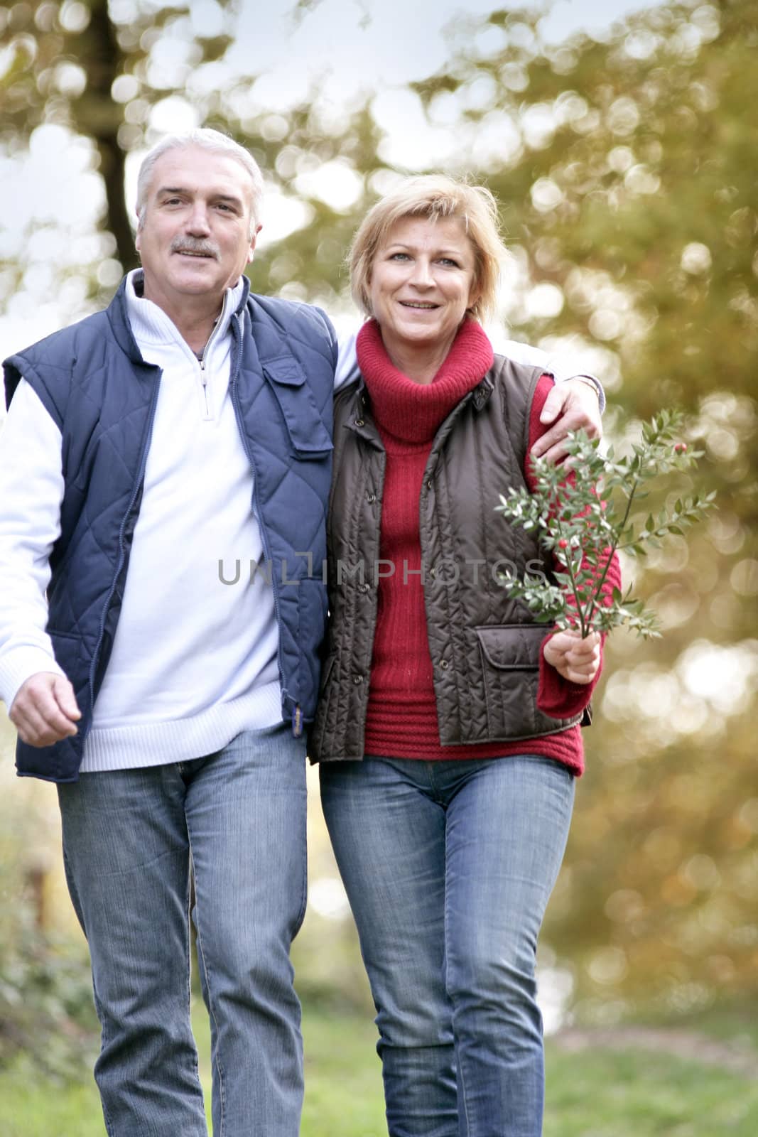 Couple taking a walk through woodland