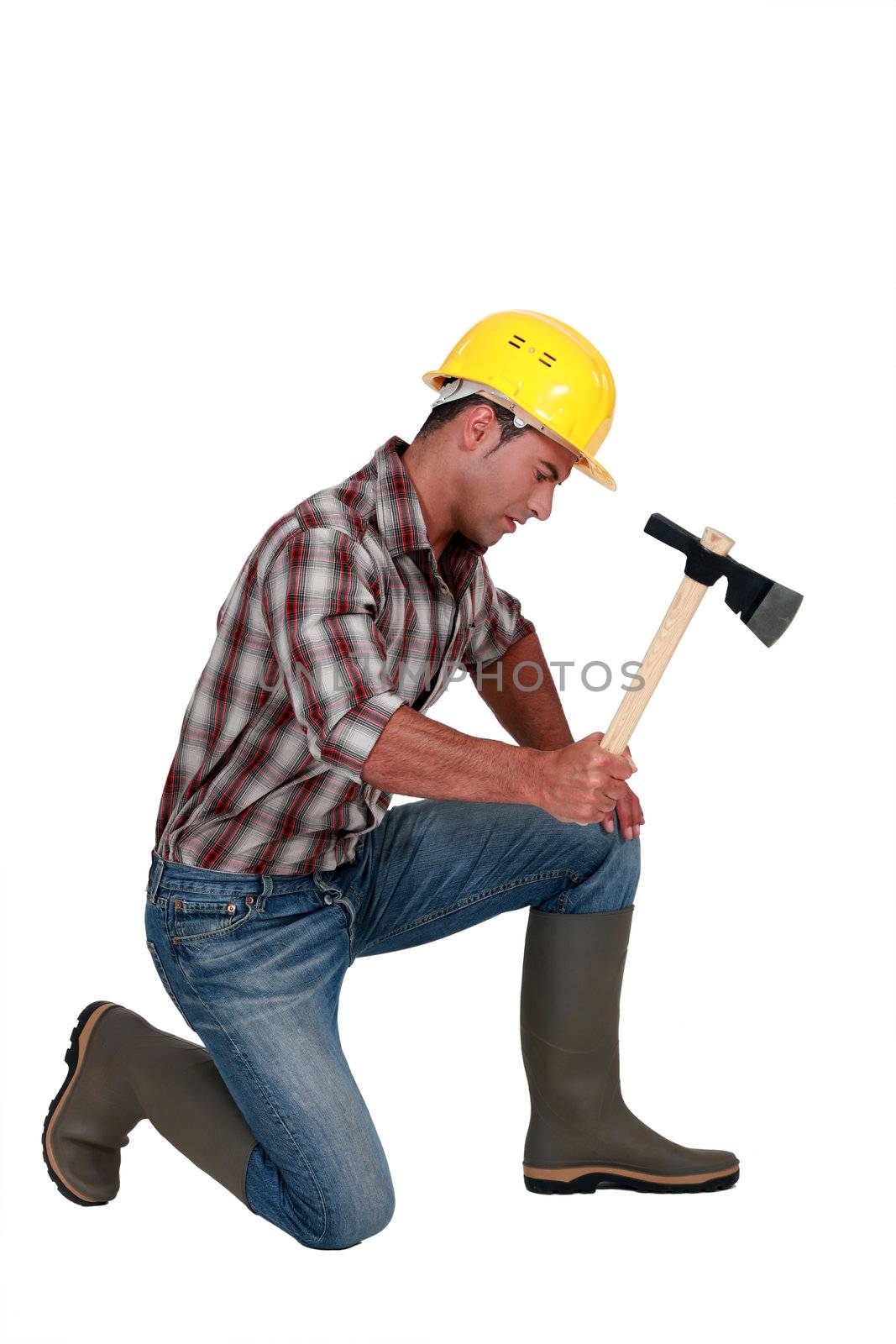 Tradesman using an axe by phovoir