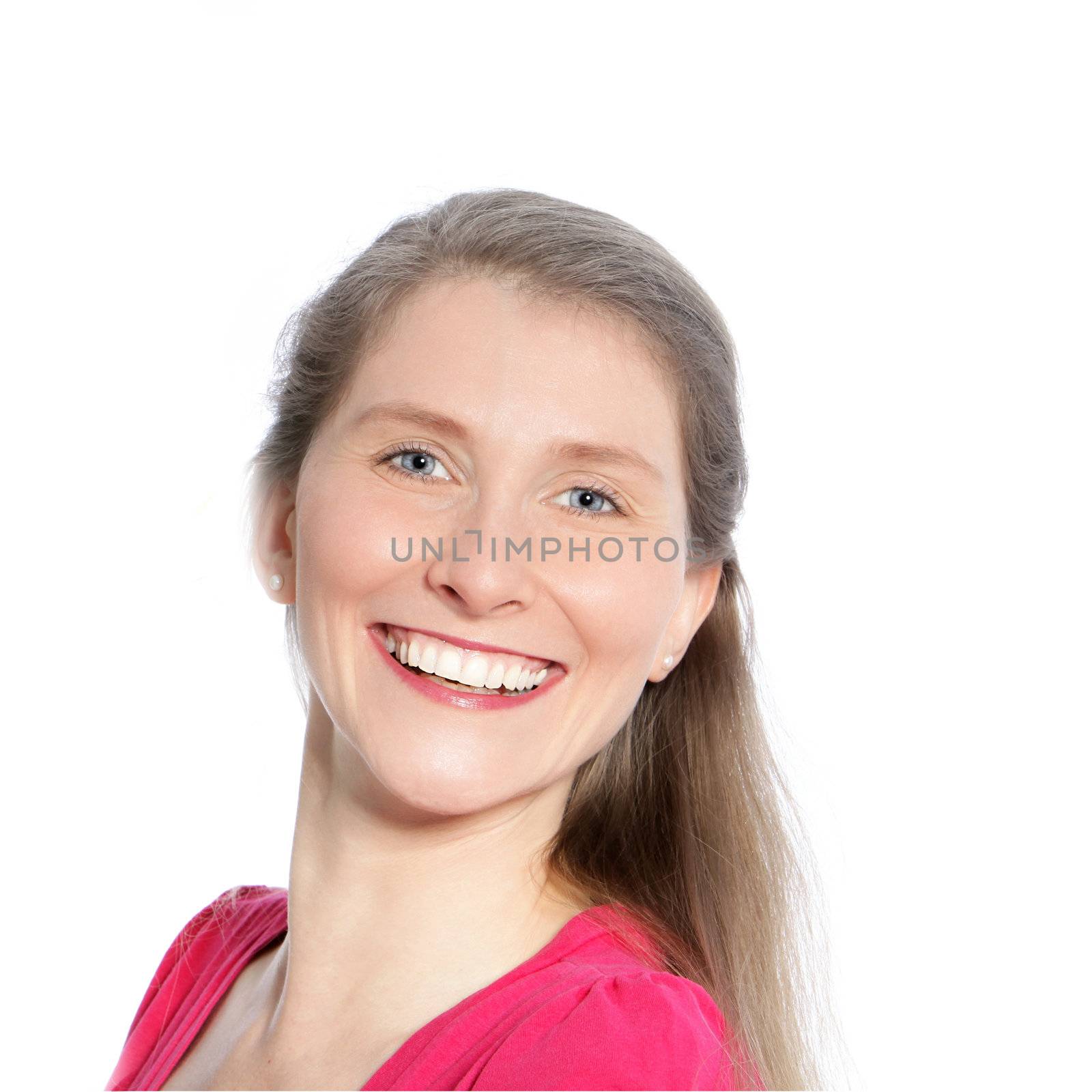 Studio portrait of an attractive happy vivacious middle-aged woman with long blonde hair isolated on white