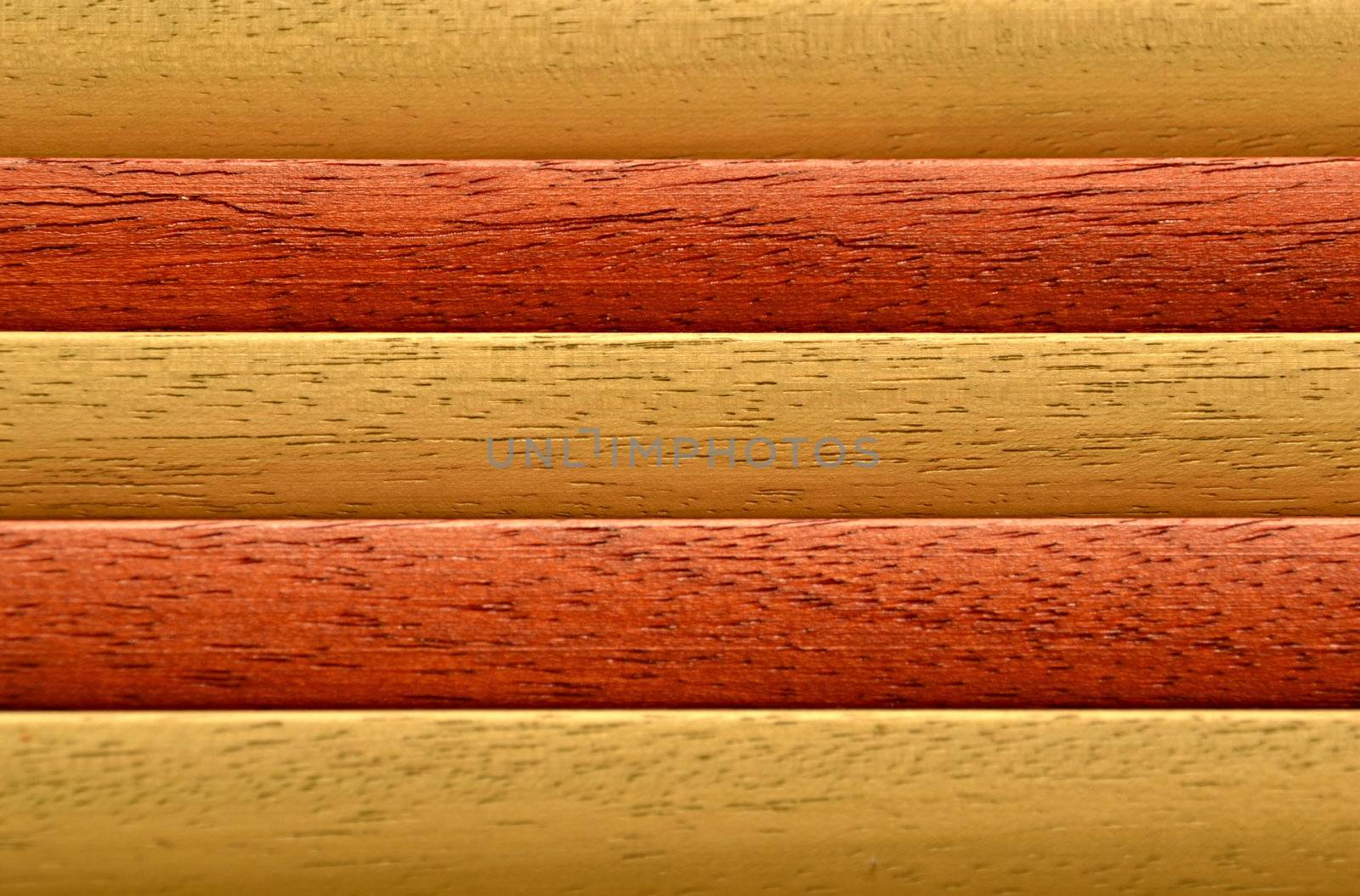 background with laths of hardwood orange and reddish brown