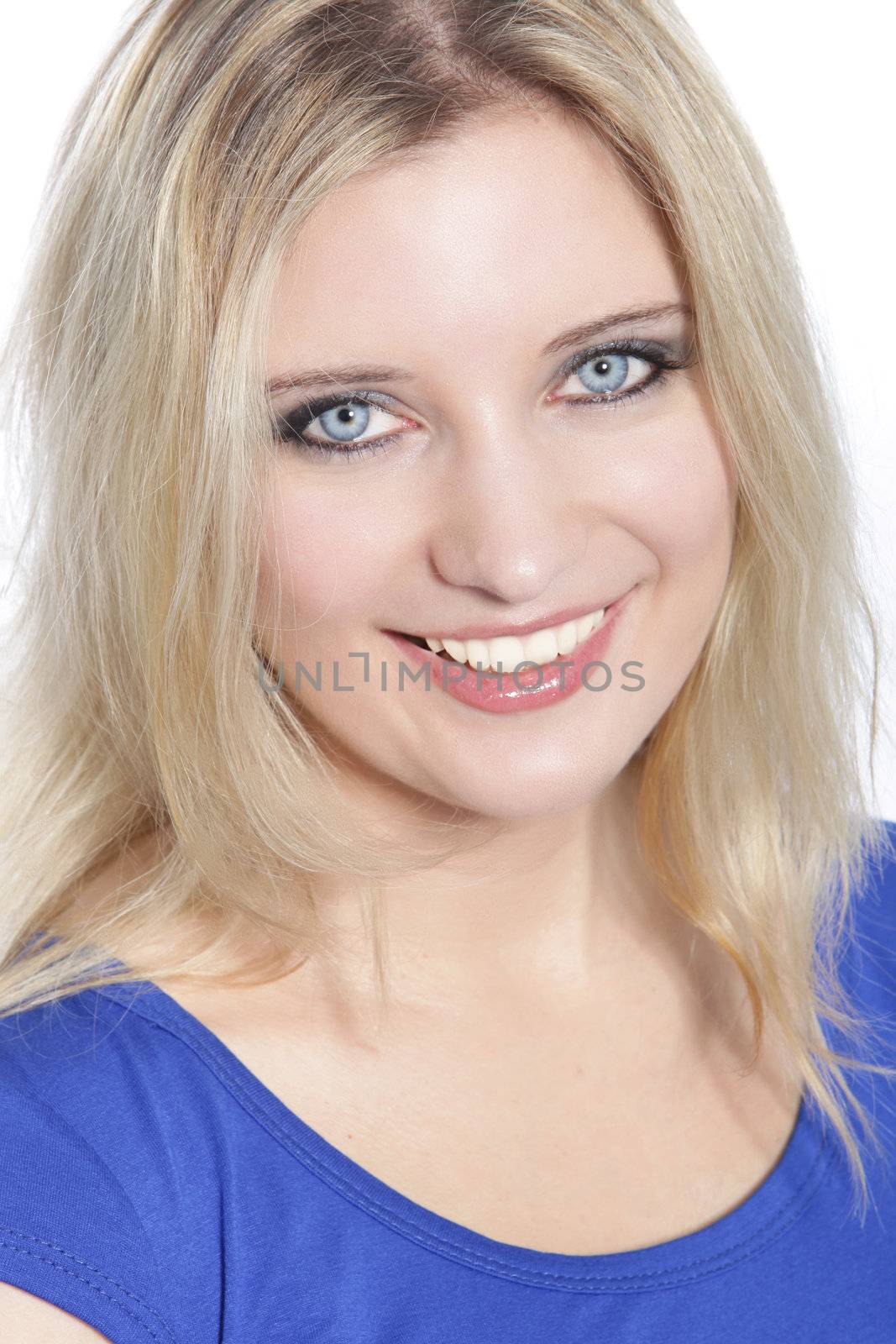 Close up portrait of smiling blonde woman