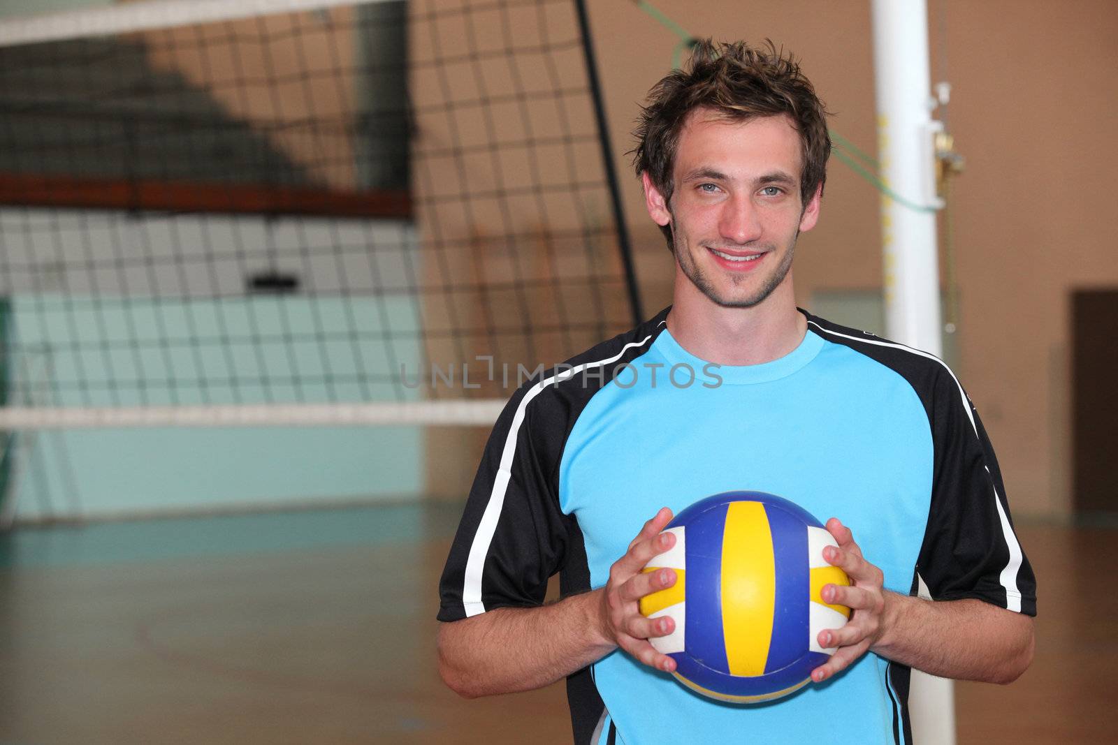 portrait of a volley-ball player by phovoir