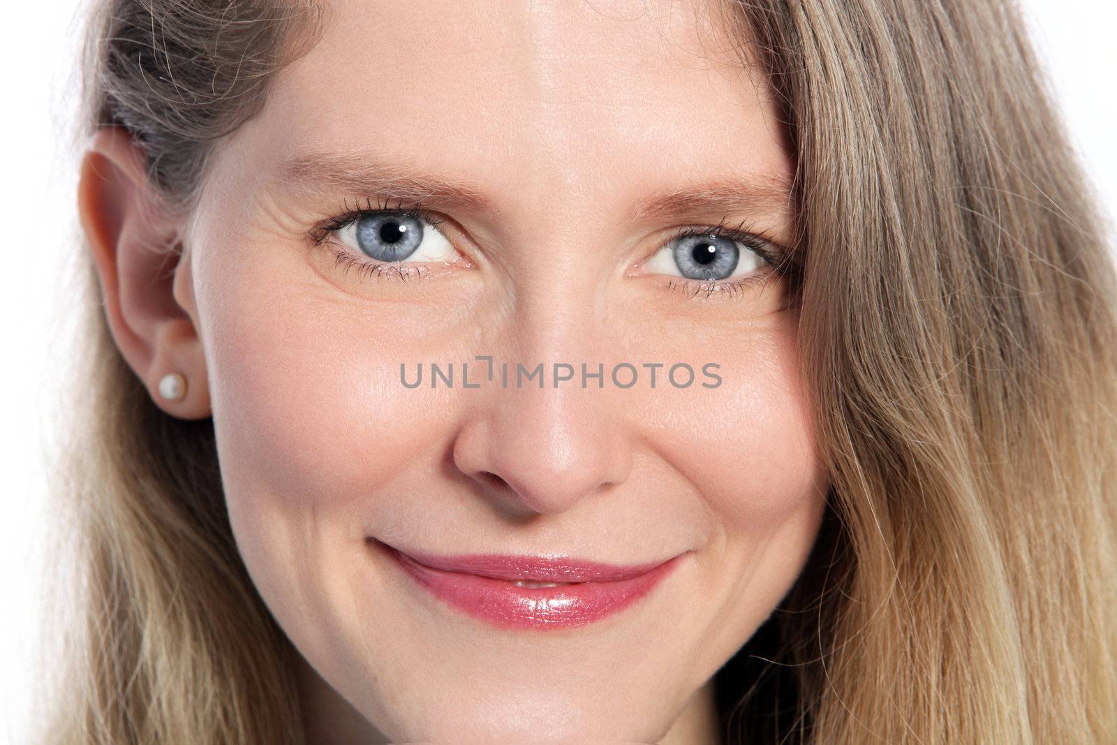 Close up portrait of happy mid age woman’s face