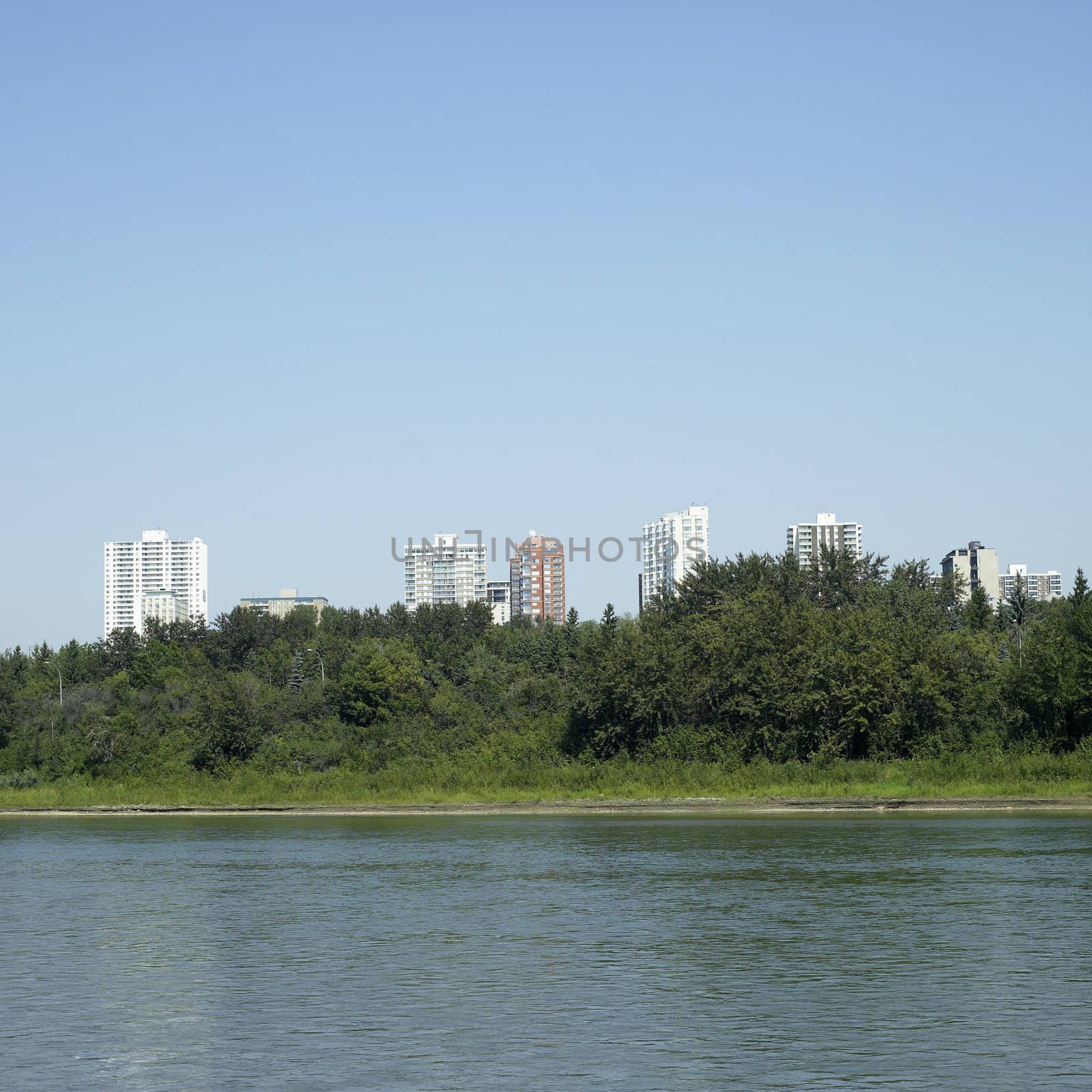 City towers near a river