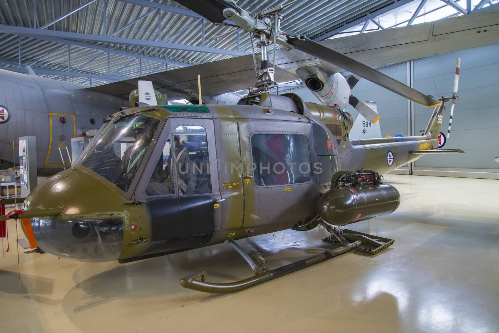 bell uh-1b huey is a military helicopter powered by a single, turboshaft engine, with a two-bladed main rotor and tail rotor, manufactured by bell helicopter textron, the pictures are shot in march 2013 by norwegian armed forces aircraft collection which is a military aviation museum located at gardermoen, north of oslo, norway.