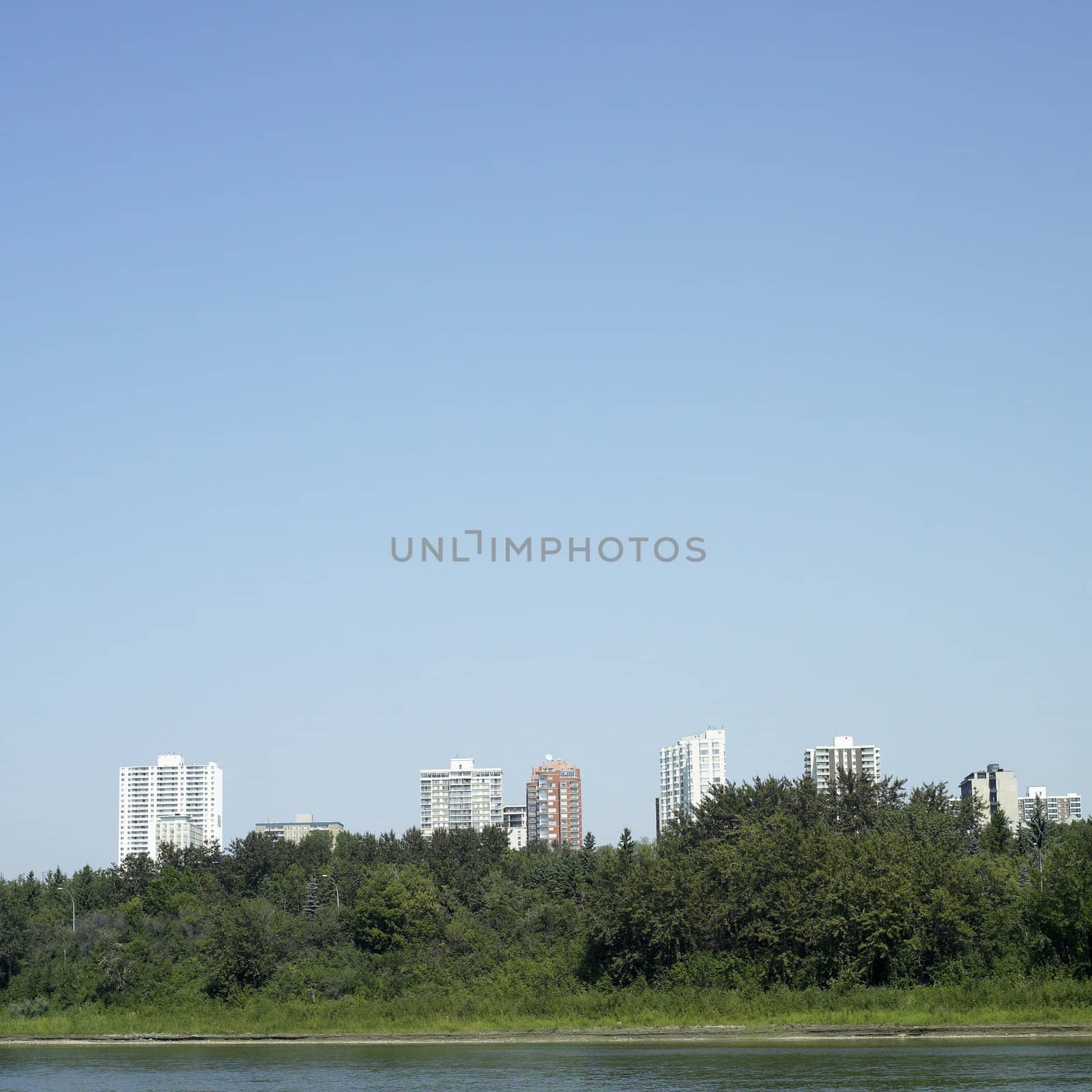 City towers near a river