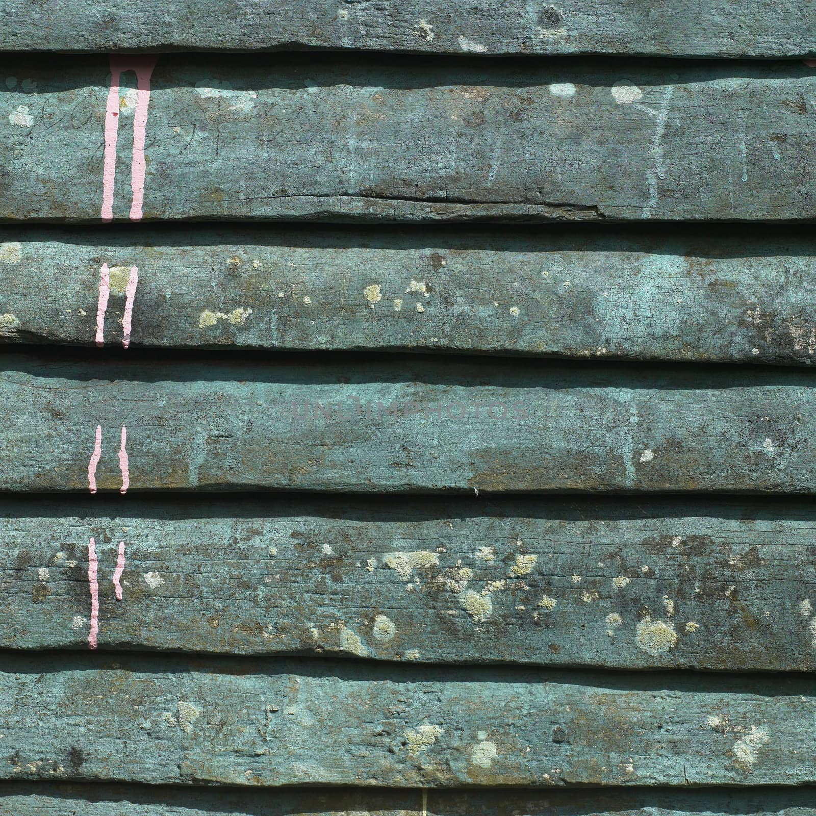 Wooden wall with paint drip