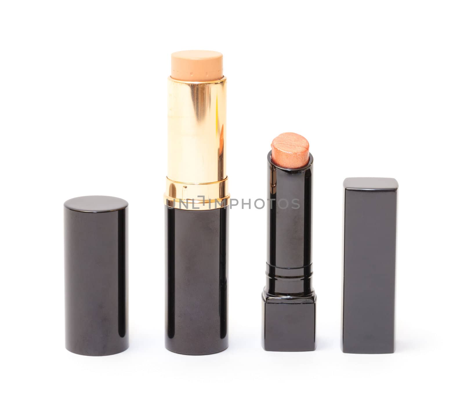 Lipstick and Foundation Cream on white background