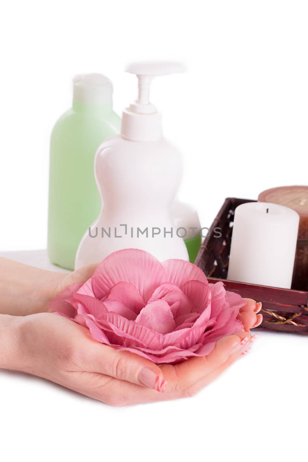 Woman hands with manicure and hand care products by Angel_a