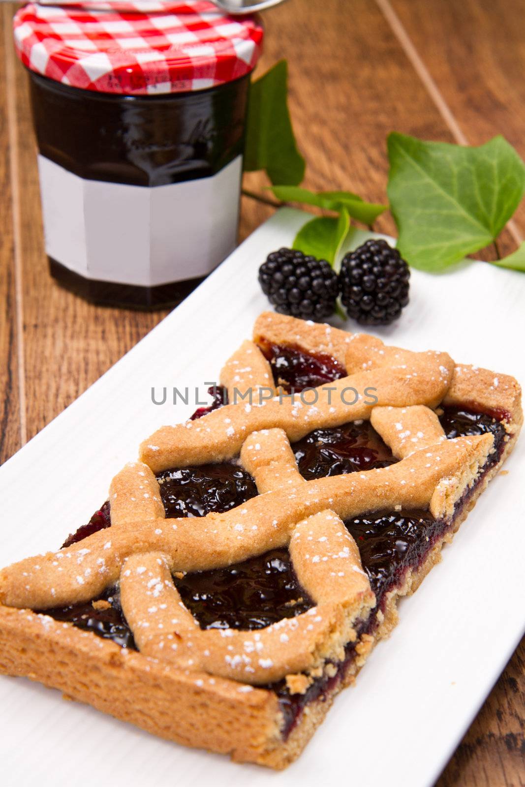 blackberry tarte on wooden table
