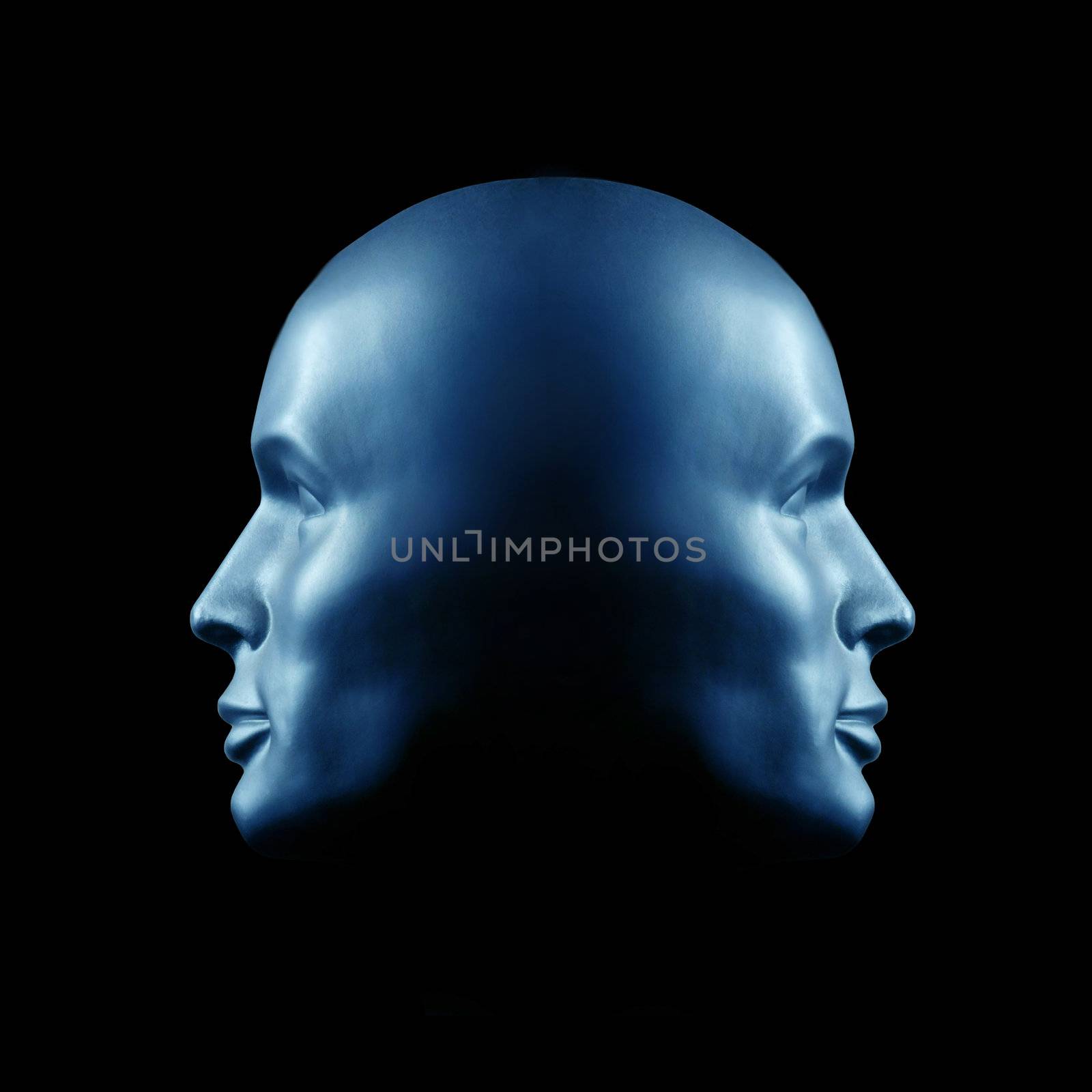 Two-faced head statue in blue light