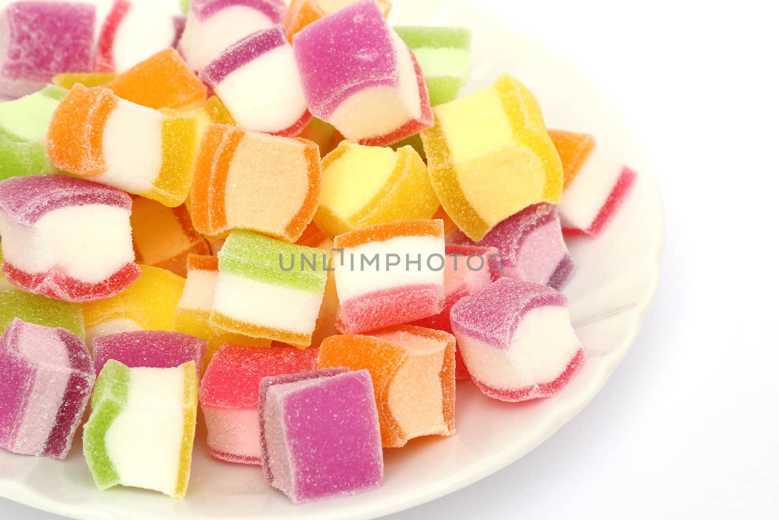 Marshmallow with gelatin dessert on a white plate