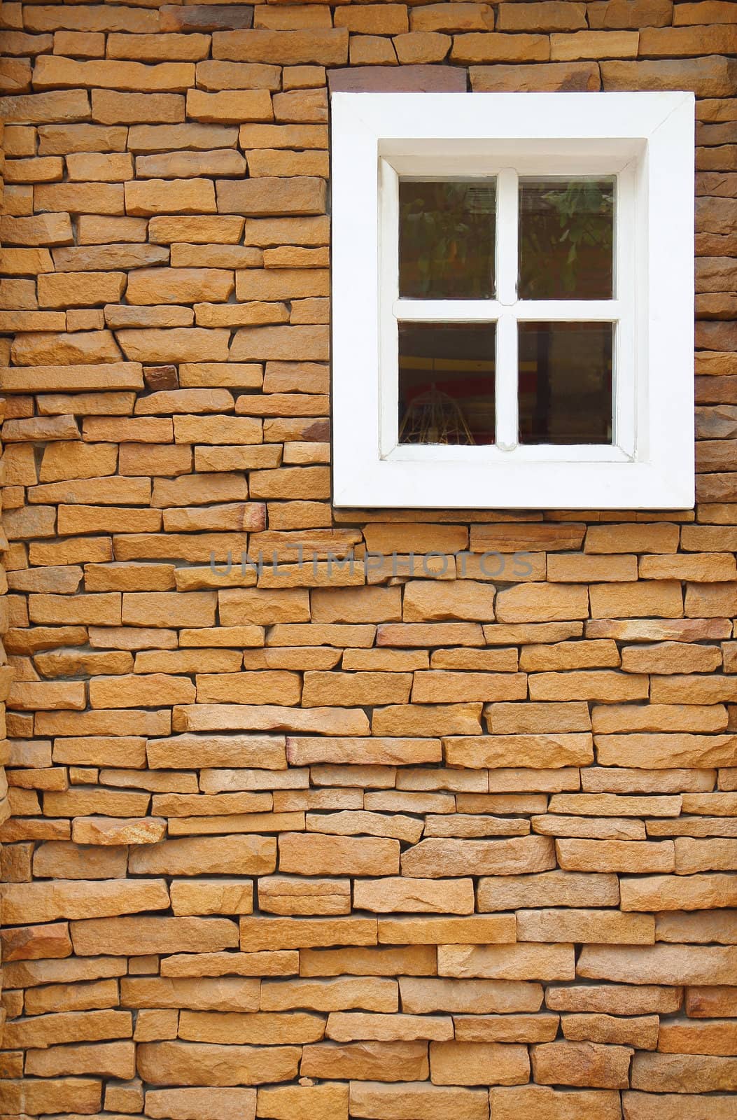 Brown brick wall and white window background
