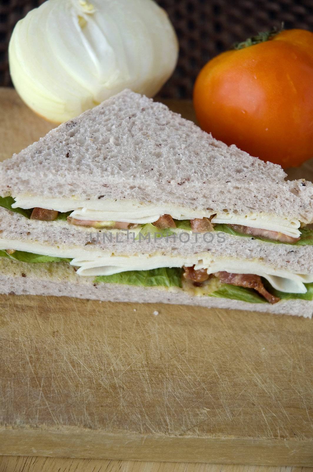 fresh gaba sandwich put on wooden with tomato and onion