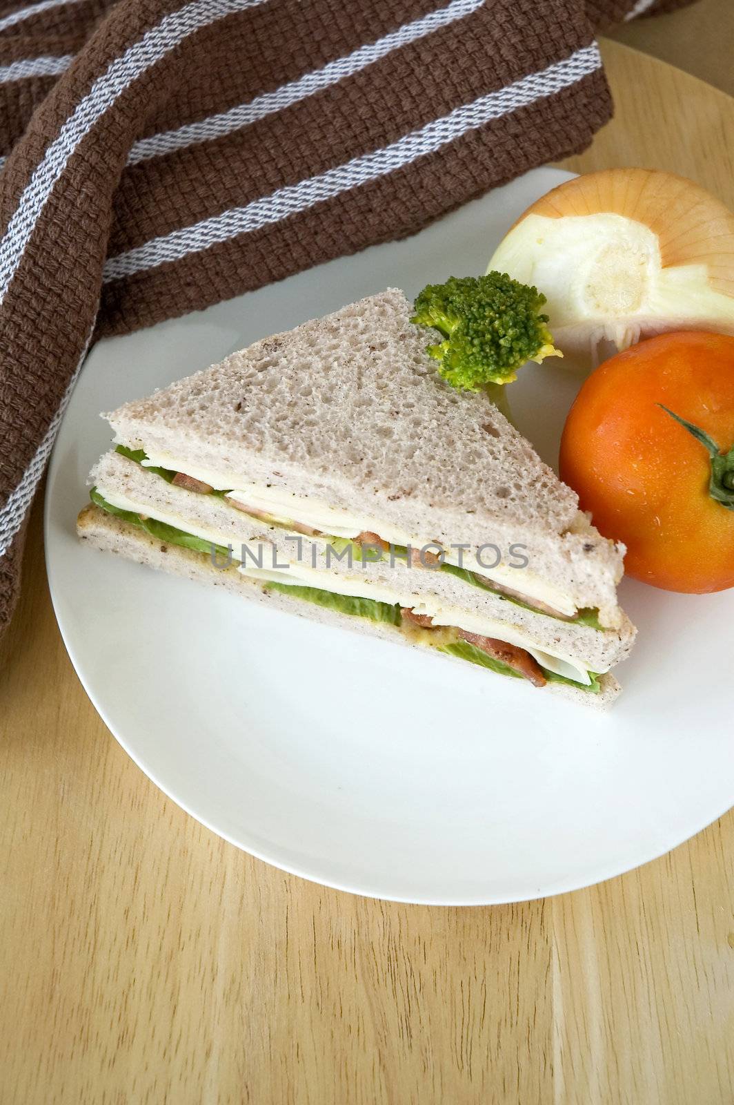 gaba bread sandwich on white plate