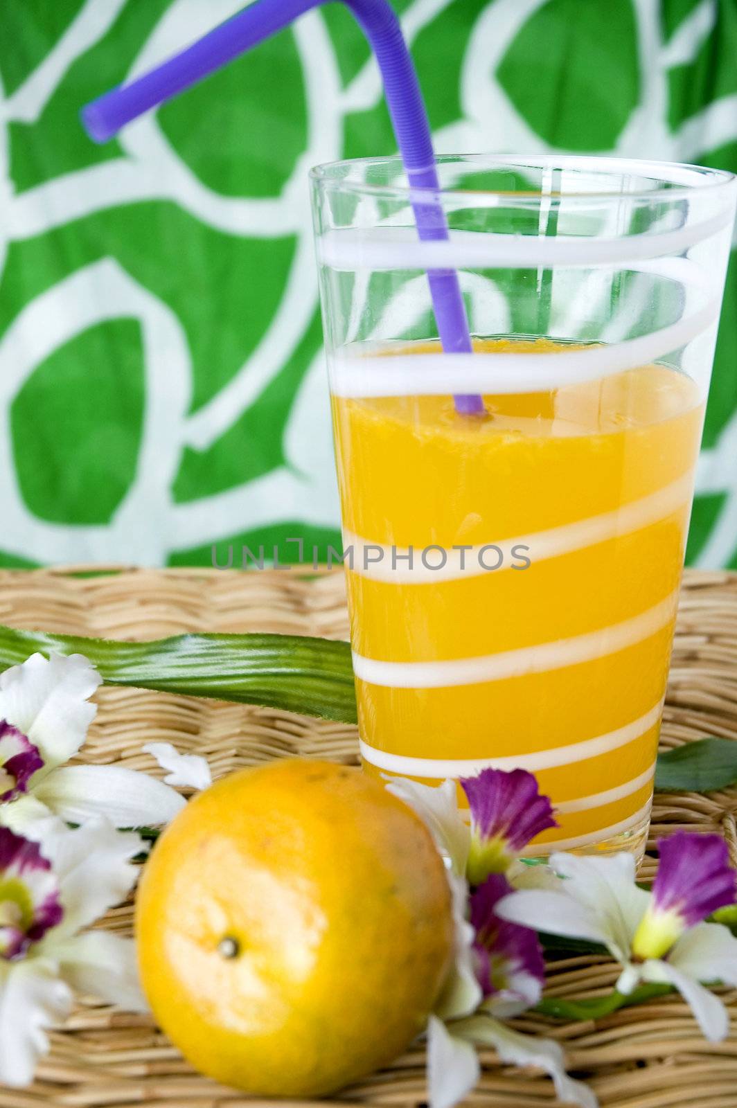 orange with glass of fresh orange juice