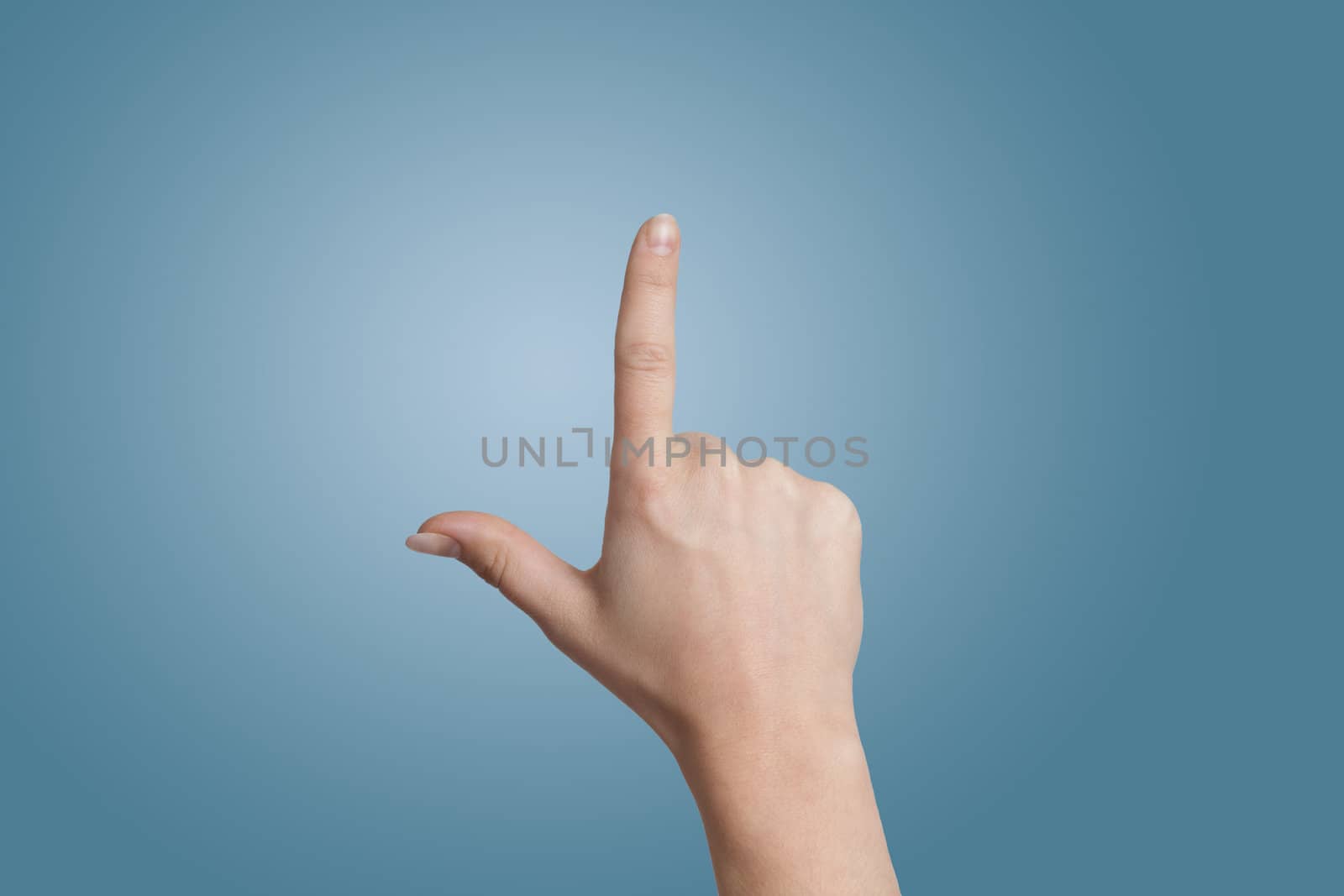 Woman hand on blue background