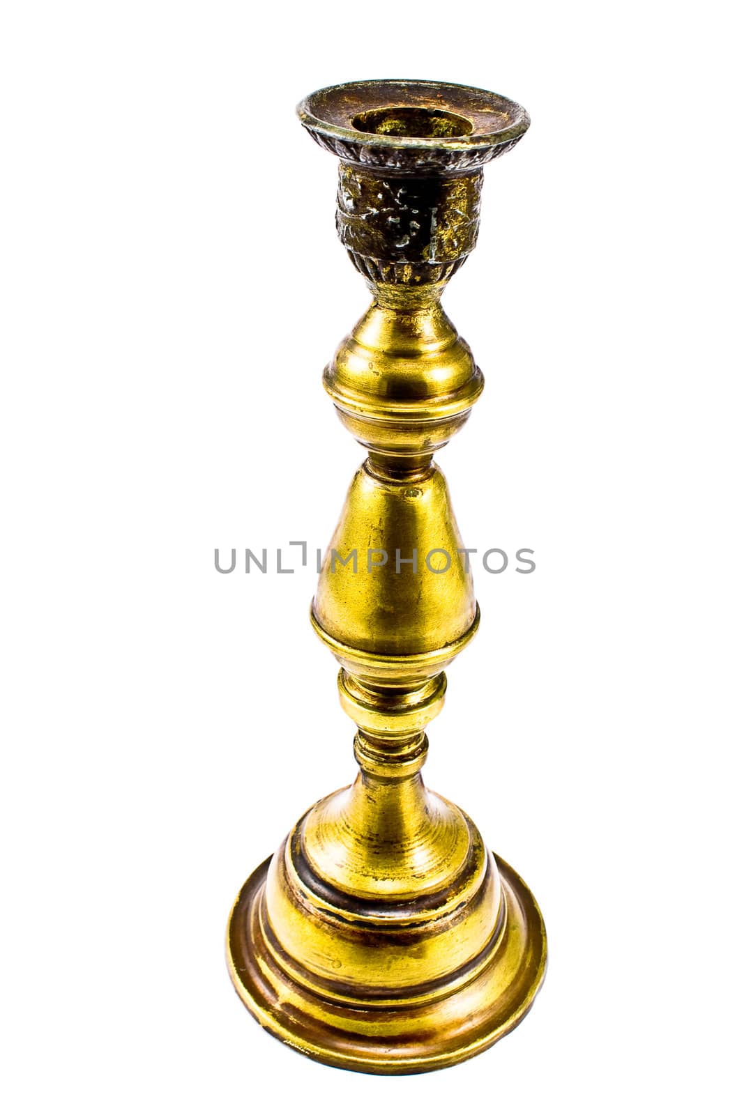 Antique brass candlestick isolated on white