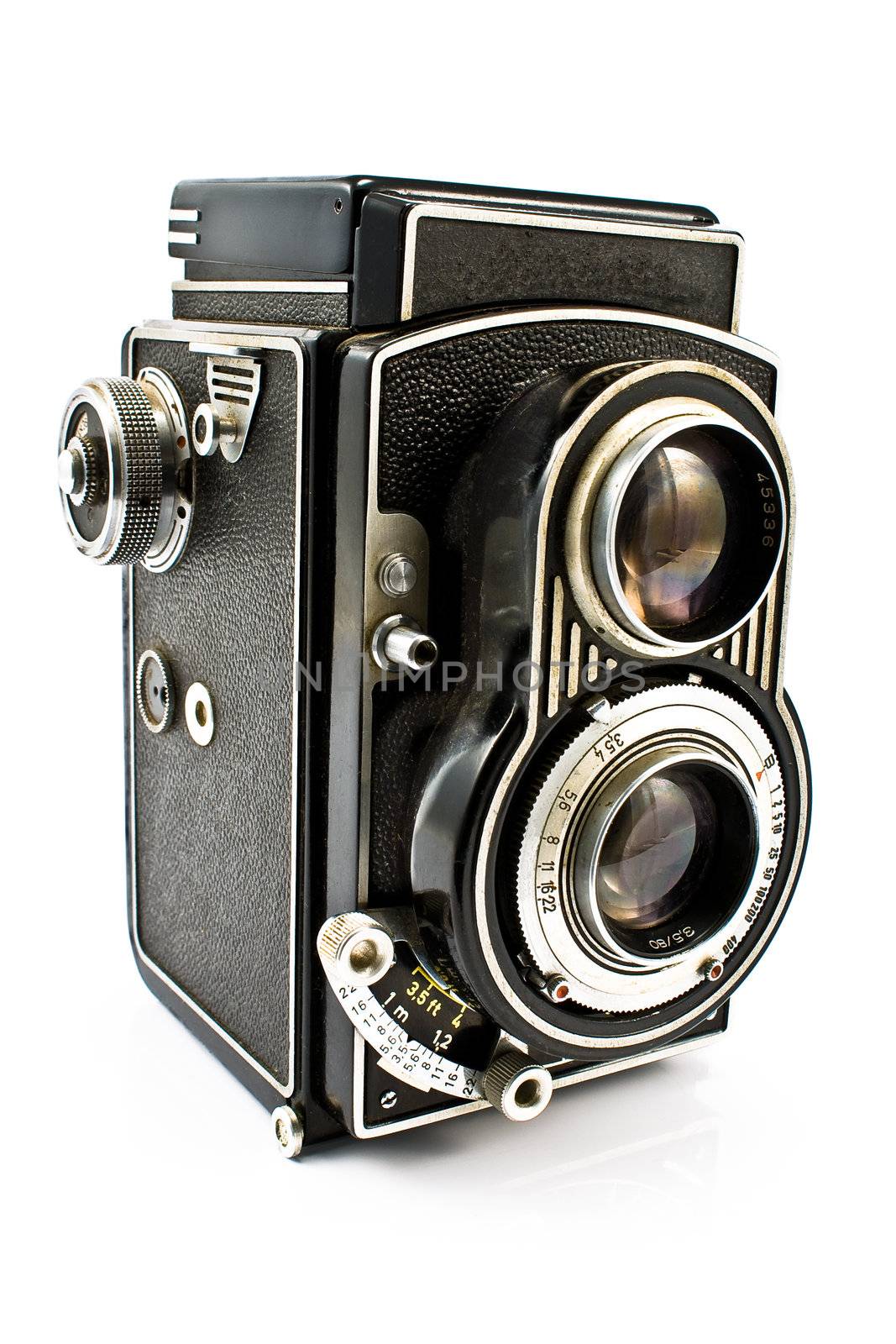 Vintage two lens photo camera isolated on white