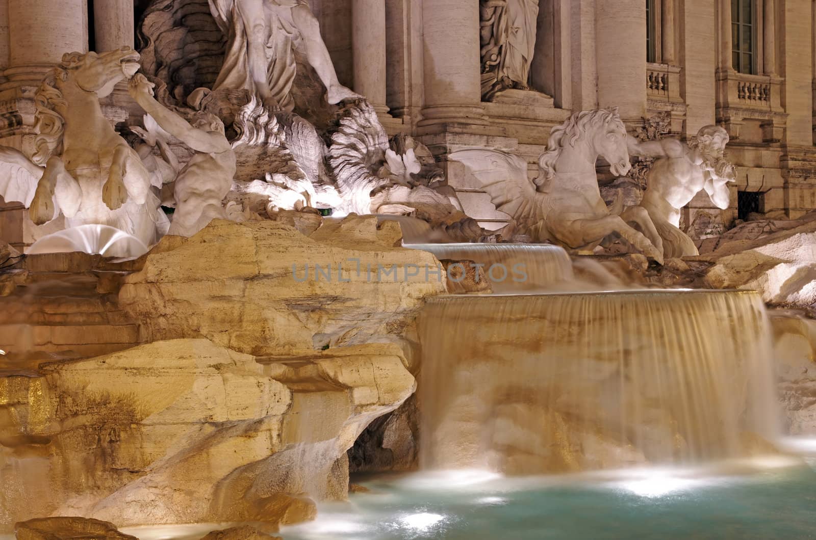 Trevi fountain details, night scene in Rome