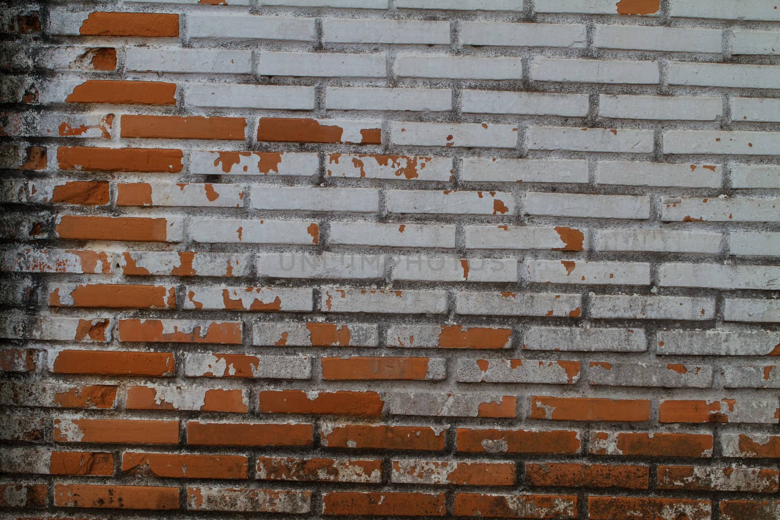 Old Wall from a red brick by thanomphong