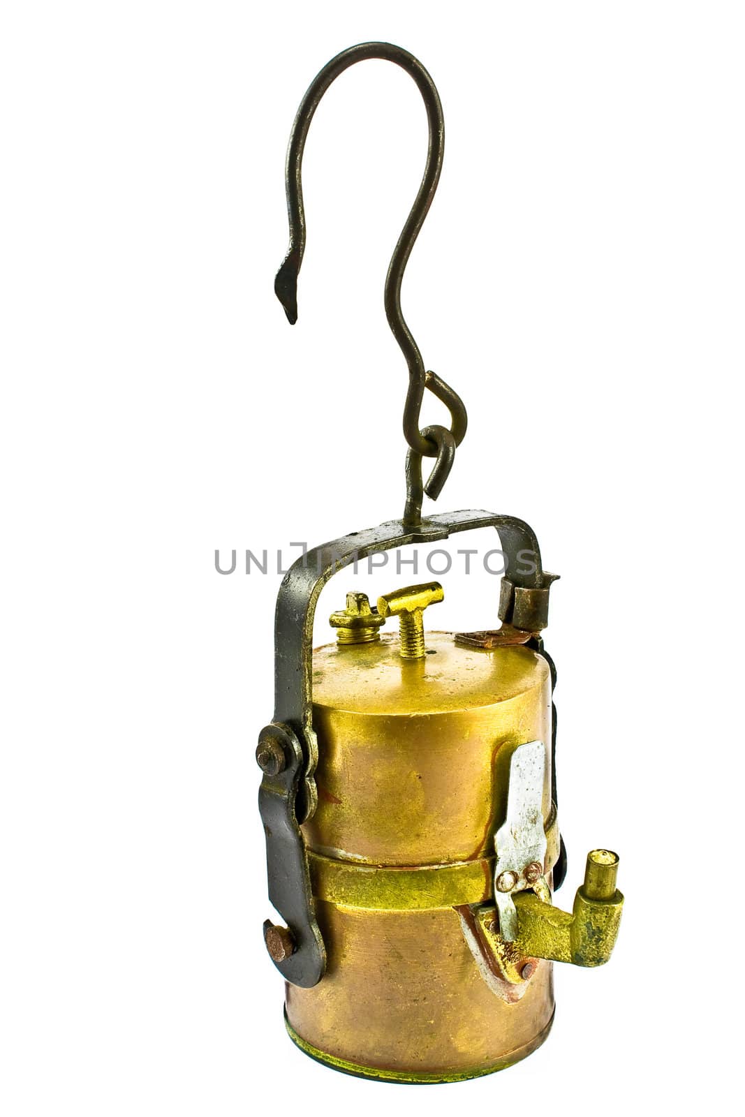 Old carbide miners lamp isolated on white